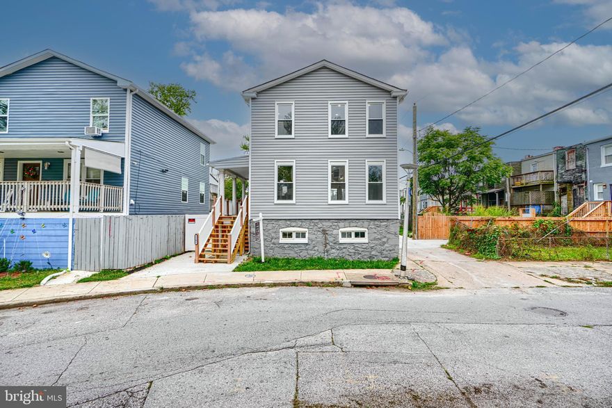 AGENTS - PLEASE VIEW AGENT REMARKS IN BRIGHT MLS.

Freshly renovated 3 BR / 2.5 baths all permits! You'll fall in love with this beautiful home at 5201 Beaufort Ave which offers a perfect blend of modern updates and charming details. As you enter, you are greeted by a welcoming faux beam entrance that adds character and warmth to the space, complemented by a custom accent wall that creates a striking focal point. The heart of the home is the modern kitchen, which features stylish two-tone cabinets that provide ample storage and visual interest. Equipped with brand-new, high-quality appliances, the kitchen is designed for both functionality and style. An island sits at the center, complete with a built-in range and plenty of seating, making it an ideal spot for casual dining, entertaining guests, or preparing meals.

Throughout the home, recessed lighting and ceiling fans have been thoughtfully installed to enhance comfort and ambiance in every room. Adjacent to the kitchen, you will find a convenient laundry room that adds to the home's practicality. The main floor also includes a powder room, perfect for guests. The bathrooms have been beautifully updated with vanity lighting and elegant stone surrounds, adding a touch of luxury. Wood accents throughout the home contribute to a warm and inviting atmosphere.

Step outside to enjoy the spacious wraparound porch, a perfect place to relax and take in the neighborhood views. The fenced yard offers privacy and security, making it an excellent space for children, pets, or outdoor gatherings. Overall, this meticulously renovated home combines modern conveniences with thoughtful design elements, creating a comfortable and stylish living environment for its new owners.

Please schedule all showings online via Showing Time.

Offers will be accepted through Thursday, October 30, 2025 at 5:00 pm.

AT SELLER'S DISCRETION, AN OFFER MAY BE ACCEPTED AT ANY TIME.