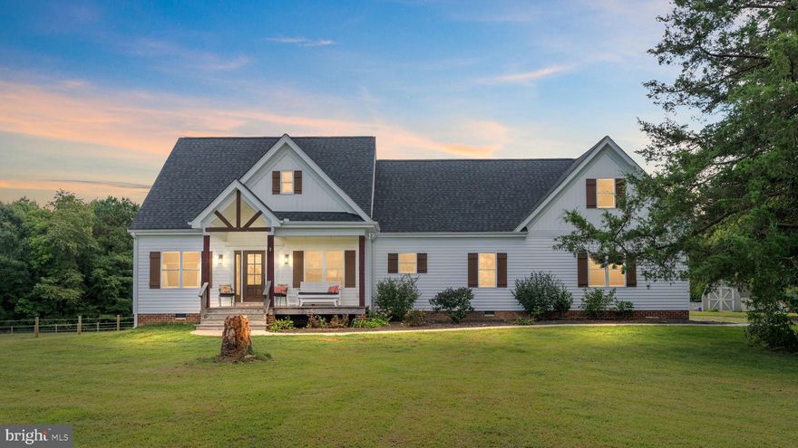 This custom-built 2020 home feels brand new! Situated on just under 6 acres, this property offers thoughtful design & luxurious upgrades, including fresh paint & hardwood floors throughout. As you step inside, you'll find a private home office with sliding doors. The designer kitchen is truly a chef’s dream, featuring a double wall oven (2020), gas cooktop, granite countertops, & brand-new stainless steel appliances (2024), including a refrigerator that conveys. At the heart of the kitchen is a stunning marble island with a barstool seating area, perfect for casual dining. The family room boasts a gas fireplace and a beamed ceiling crafted from restored wood sourced directly from the property as well as French doors leading to the expansive screened porch, ideal for indoor/outdoor living. The dining area features a custom chandelier and additional glass doors that open onto the screened porch, offering a picturesque backdrop for mealtimes. Perfect for relaxing weekends or entertaining the rear screened porch includes a floor-to-ceiling stone fireplace and offers breathtaking views of the surrounding natural landscape. The spacious primary suite is a luxurious retreat complete with a large walk-in closet featuring built-in shelving. French doors provide access to the screened porch, while the ensuite bath offers a clawfoot soaking tub, walk-in shower, and a water closet. Two additional bedrooms share a full hall bath with a walk-in shower. A spacious laundry room & a powder room for guests complete the first floor. The unfinished second floor offers incredible potential for expansion. With electricity already in place, it is framed for a bedroom with 2 walk-in closets, a living area, a full bath, a laundry room, & storage. Enjoy getting away from it all while still having easy access to it all... only 20 minutes from area shopping & dining on the Hull Street corridor and local recreation & attractions including the Richmond Metro Zoo, Magnolia Green Golf Club, & Birkdale Golf Club!