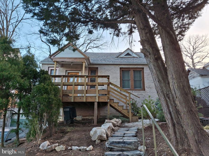 This inviting 3-bedroom, 2.5-bathroom home offers a practical blend of traditional Takoma Park character and thoughtful modern updates. Currently transitioning through a series of owner-led improvements, this residence is ideal for someone looking for a comfortable move-in-ready space with the flexibility to add their own personal touches over time.

Functional Interior Spaces
Light-Filled Living: The main level features original hardwood floors and large windows that bring in steady natural light, creating a simple and warm atmosphere.

Kitchen & Breakfast Nook: A functional kitchen layout includes a cheerful bay-window alcove, perfect for a casual breakfast table or indoor herb garden.

Refreshed Bathrooms: The bathrooms have been updated with clean, modern fixtures and neutral finishes, offering a bright and tidy aesthetic.

Lower Level Flex Space: The finished basement provides valuable extra square footage, suitable for a home office or hobby room, and features a private sauna—a unique retreat for relaxation.

Outdoor Living & Urban Farming
The front yard features new sod and tidy garden beds, paired with a classic front porch ideal for relaxing and connecting with the neighborhood.

Large Private Backyard: The oversized, fully fenced lot is a standout feature. Equipped with a storage shed and a chicken coop, it is perfectly set up for those interested in gardening or urban homesteading.

Location & Opportunity
Situated just minutes from the Takoma Park Metro, local dining, and community parks, this home offers a steady entry point into a premier neighborhood. Take advantage of the significant updates already in place while you envision the final stages of this home’s evolution.