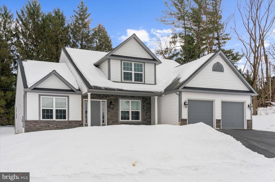 Fantastic opportunity to own a “practically new” home in the highly desirable Heidelberg
Crossing subdivision!
Built by Grande Construction and completed in October 2022, this stunning Trenton model is
situated on a premium lot and boasts over $90,000 in upgrades.
The exterior’s vinyl siding and stone façade create beautiful curb appeal, welcoming you onto a
spacious covered front porch accented with classic Craftsman columns. Step inside the inviting
foyer and you’ll immediately appreciate the open yet thoughtfully defined floor plan.
The elegant Dining Room features a tray ceiling and offers the perfect intimate setting for
entertaining. The impressive two-story Great Room truly lives up to its name, with soaring
ceilings and a cozy stone gas fireplace that seamlessly flows into the gourmet kitchen and
informal dining area.
The heart of the home is the expansive kitchen, complete with:
• A large center island with seating for four
• High-end stainless-steel appliances
• Gorgeous tile backsplash
• Painted Shaker-style cabinetry
• A separate pantry closet
Just off the kitchen, the bright and airy sunroom is filled with natural light thanks to two
skylights and sliding glass doors leading to a 12’ x 12’ composite deck — ideal for morning
coffee or evening relaxation.
The first-floor primary suite offers a peaceful retreat with a vaulted ceiling, dual walk-in closets,
and a luxurious en-suite bath featuring a painted vanity with a granite top and a custom-tiled
shower with both rain and wall showerheads.
Completing the main level is a powder room, a convenient laundry room located just off the
entrance to the two-car garage. The garage includes exterior keypad entry, a man door, and
interior stairs leading to the basement for added convenience.
The staircase to the second floor is enhanced with wrought iron spindles, adding to the subtle
attention to detail found throughout the home. Upstairs, you’ll find three private bedrooms and a
second full bath, offering comfortable accommodations for family and guests alike.
The basement is awaiting your creativity. With 9-foot foundation walls and generous additional
square footage, the space provides endless possibilities for storage, recreation, or future finished
living space. Direct exterior access makes bringing in materials, furniture, and décor a breeze.
Do not miss this exceptional opportunity to own a move-in ready home with upgrades already complete!