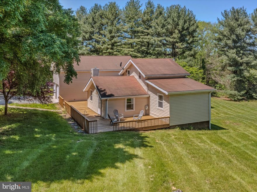 Peaceful lifestyle with water adventures at Sleepy Creek!  Come see this unique contemporary cabin on 2.51 acres with picturesque sunset views over a shared pond. Comes with a convenient attached garage as well as an enormous 30x60 detached garage for the car or hobby enthusiast-could hold 6+ cars or everything for your creative pursuits!  The 4 bedroom 2 bath house has over 2600 finished square feet with ample decking and a 13x12 screened porch for outdoor entertaining.  Perfect place for birdwatching and deer playing in the yard.  Additional garden shed for all your planting needs. Private community WATER ACCESS on Sleepy Creek at Steamboat Landing is just down the road!  This tranquil place is a real hidden gem that is a must see! 
SELLERS WILL GIVE CREDIT FOR  ROOFING ALLOWANCE WITH ACCEPTABLE OFFER