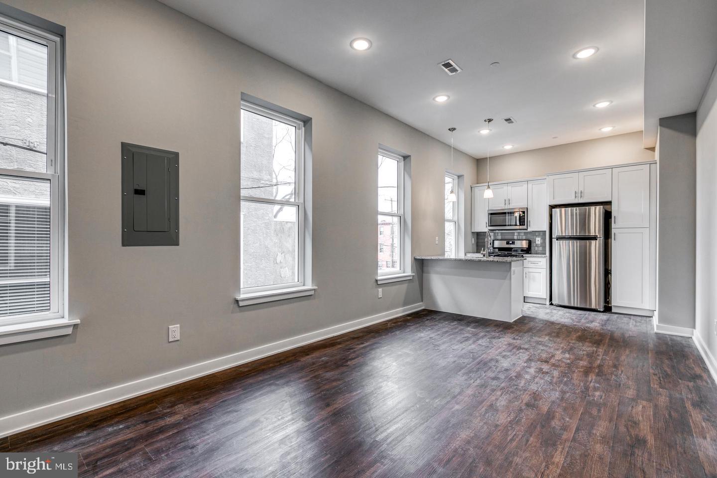 Newer construction apartment located right on Broad Street!. This 1 bed/1 bath unit has top of the line finishes throughout with tons of natural sunlight and about 1,300 sqft of living area. The unit is complete with hardwood flooring throughout, recessed lighting, large eat-in kitchen, quartz countertops and stainless steel appliances. Each unit has central air its own washer and dryer. Tenant is responsible for $50/month for the water. This building consists of 6 new construction apartments, common backyard space and a common roof deck with great skyline views! Located close to public transportation and all of the great new bars and restaurants in Passyunk Square. Schedule your tour today as these will not last long!