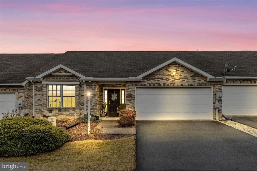 Enjoy the community of Moss Spring Estates with this modern all-brick Rancher. You will love the one-level living this home offers featuring 2 bedrooms and 2 full baths, vaulted ceilings and an open floorplan. The 2-car garage will be most convenient and this home backs to open space for privacy. This location is convenient to everything you need.  Plus, snow removal and lawn maintenance is included!