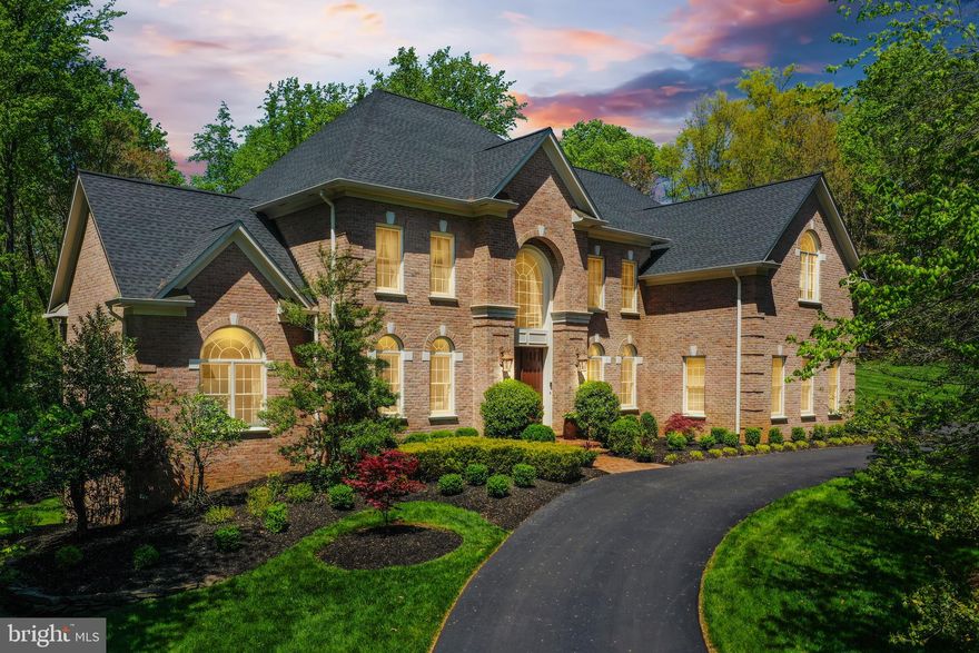 Introducing a masterpiece of elegance and craftsmanship, this exquisite residence embodies luxury living at its finest. Nestled on a sprawling 2.66-acre lot in a prime location, this meticulously designed home offers a sanctuary of sophistication and style.
Boasting a well-built structure and impeccable attention to detail, every corner of this property exudes quality and charm. From the moment you arrive via the grand circular driveway, you are greeted by the grandeur of this exceptional estate.
The expansive lot size of 2.66 acres provides ample space for outdoor enjoyment and endless possibilities for landscaping and recreation. Whether you seek tranquility in the beautifully landscaped grounds or entertain guests in the spacious outdoor areas, this property offers the perfect balance of serenity and sophistication.
Luxurious living spaces, high-end finishes, and panoramic views further enhance the allure of this remarkable home. Experience the epitome of luxury living in this distinguished residence that harmoniously blends timeless elegance with modern convenience.
This all-brick home showcases three levels of living-space with 6 bedrooms 4 1/2 bathrooms, hardwood floors and crown molding throughout, a grand two story ceiling foyer, curved stairways with twist and basket wrought iron baluster, powder room, coat closet, spectacular great room with two story Palladian windows and motorized blinds and gas fireplace. Living room with gas fireplace and motorized window blinds, Dining room also with motorized window blinds, Butler’s pantry with a brand new 1 week old wine cooler. Study/Office with french doors and large windows. Home theater/Media room with a state of the art surround sound system. Speakers throughout the house. Amazing gourmet kitchen with white macauba stone counters, oversized stainless steel sink, instant hot water dispenser, oversized island also with sink and garbage disposal, all high end appliances, Sub Zero refrigerator, Wolf 6 burners gas stove and a wall mounted pot filler, Wolf ventilation hood, Wolf plate warmer, Jen-Air microwave and wall oven, Jen-Air trash compactor, Bosch dishwasher. Second stairways connecting to upper level. Walk in pantry. Breakfast room with built in and sliding glass doors to deck. Sunroom with gas fireplace. Laundry room with built in cabinets, utility closet and Bosch front load washer and dryer. 
The upper level boasts 4 en-suite bedrooms. The primary suite features large his and hers walk-in closets, each one with its own digital safe and a breathtaking primary bathroom, with skylights, dual vanities, soaking tub, heated floor and a spa dual shower, towel warmer, bidet, fridge and tv.
The bright lower walkout level is fully finished, with french doors and large windows, 2 additional bedrooms, a full bath, a huge recreation room, a gym and lots of storage.
The Trex deck has a Wolf stainless steel gas barbecue grill connected to the gas main line.
The enormous patio with the pergola and the brand new one year old 18’ swimming hot tub and spa, is great for entertaining. Garden lighting.
Oversized side load and heated 3 car garage with epoxy floor.
The brand new roof with heat extractors and the 75 gallons hot water heater was replaced in 2023.
Additionally, this property has the following features: Alarm system, 2 HVAC zones, central humidifier, electronic air filter, central vacuum, irrigation system, tree lighting, playground set and a generator.