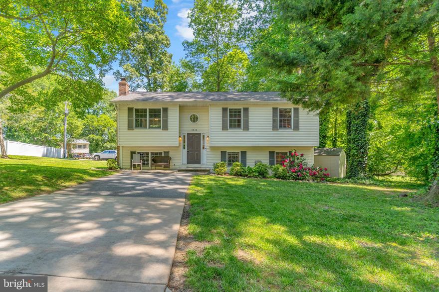 Move right in to this spacious refreshed home located in the Chesapeake Bay water front community with beach access known as Calvert Beach.  Inside you will find a traditional floor plan, main level family room with wood burning brick fireplace, a kitchen open to the dining area and slider leading to back deck overlooking level yard.  Three bedrooms including primary bedroom with private bathroom, two additional bedrooms and full bath in hall. Lower level has recreation room with brand new carpet, full bathroom, storage room and laundry room.  The current storage room can easily be converted to a fourth bedroom.   Two separate parking areas offer plenty off street parking.  Great level corner lot with play set and storage shed.  Enjoy the sandy community beaches, take a walk to Flag Harbor, take advantage of day care and rec center just down the street or head to the shops located close by in Saint Leonard.  Calvert County offers local parks, pools and more plus easy commute to Washington DC, Baltimore, Annapolis and several military bases.