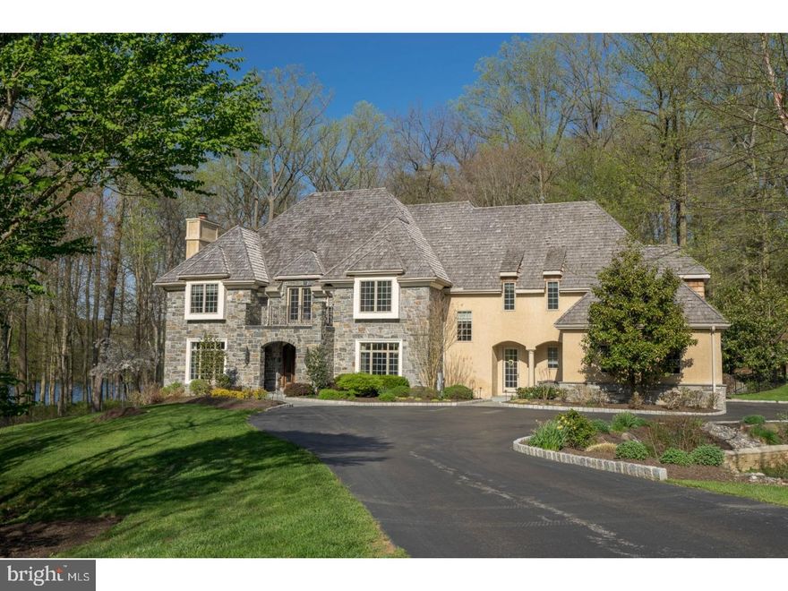 Price Improvement of $200,000! Amazing value for this exceptional, custom built manor home with views of Springton Reservoir. Pool's open...move in before summer. The ultimate entertaining house with an open concept floor plan. Enter through the solid cypress front door to the the grand foyer with 10' ceilings, hardwood floors with inlaid detail and curved staircase. The Living Room, with gas fireplace is a perfect, intimate gathering space. It is a pleasure to work in the corner study. The turret boasts a built in desk to take advantage of the amazing water view. Off the center hall are french doors that lead to a wrap around deck to sit and enjoy nature and 215' frontage of Springton Lake. Continue to the spacious, light-filled Family Room with gas fireplace with limestone surround and floor to ceiling windows. The Gourmet Kitchen features high level appliances (Sub Zero, Thermador, Bosch and a built-in Miele coffee/cappuccino maker) custom cabinets and a large island with granite countertops. The Butler's Pantry with beverage fridge and extra sink leads to the large formal Dining Room. The sunny breakfast room has wrap around windows overlooking the pool, hot tub, slate patio & gazebo. The second level features 5 bedrooms and 4 full baths. The Master Bedroom has a tray ceiling and cozy window seat. The juliet balcony is great for star gazing or enjoying a cup of coffee. There are two walk-in closets with built-in custom closet system any clothes horse would love. You will never want to leave the luxurious master bathroom! His and hers furniture inspired vanities, a spacious shower with bench and dual shower heads. Relax in the soaking tub while savoring the view! There are two additional bedrooms with en-suite baths and two bedrooms that share a jack-and-jill bathroom. Convenient second floor laundry room with steam valet. The huge walk-out Lower Level is the perfect entertaining space! The handsome, custom bar is a focal point as well as a workout area, pool table space, & TV area. Relax and entertain in the gorgeous pool and hot tub! There is a four car attached garage, generator and public sewer. Located near the popular town of Media, with it's myriad of restaurants, shops, food festivals and "Dining Under the Stars." Also adjacent to Newtown Square with the new Ellis Preserve shopping center and upcoming Whole Foods. A short drive to Episc. Academy, other private schools and wonderful Rose Tree Media schools.