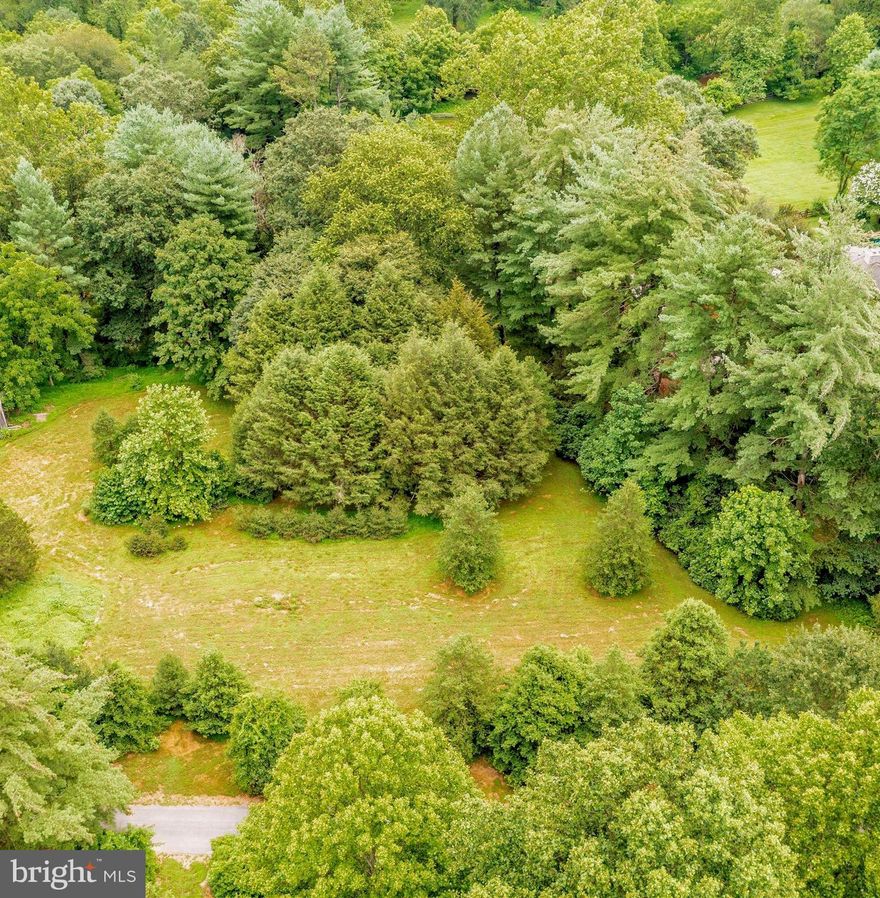 Rare 1 + Acre Buildable Lot in Howard County – Prime Location an area of strong supporting value homes.  
Tucked away in one of Howard County’s most desirable areas, this mostly level and tree studded property  offers the perfect blend of privacy, natural beauty and convenience,  Mature trees  give you a jump start on landscaping and provide a serene backdrop for your dream home while still leaving ample open space for homesite.  

The lot was perc approved in 2004 with a 10,000 square foot approved area.  There is a well on the property.  

Enjoy the peaceful surroundings of a quiet, established area—just minutes from major commuter routes. Centrally located with easy access to Washington D.C., Baltimore, Annapolis, and Frederick, this lot is ideal for those seeking a tranquil setting without sacrificing connectivity.

Whether you’re building your forever home or a weekend retreat, this lot offers:
*Close proximity to shopping, dining, and top-rated Howard County schools
*Easy access to I-70, Route 32, and Route 97+

*Bring your builder and your vision—this is a unique opportunity to create something special in a highly sought-after location.

Shared paved driveway with 2 other homes. 

Lot 1 on plat in documents.