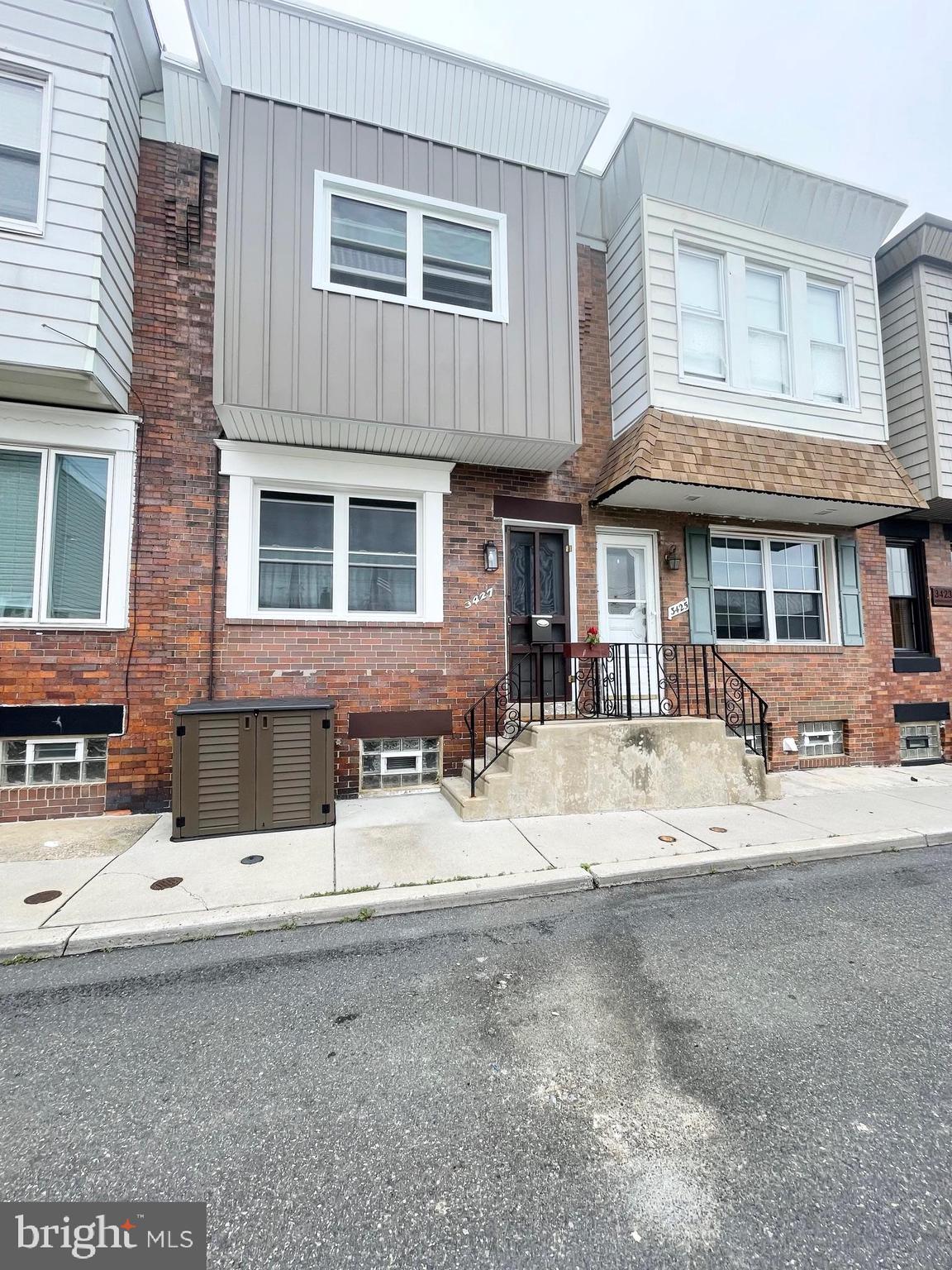 Beautiful & Updated 2 Bedroom, 1.5 Bath 2-Story Row Located on Great Port Richmond Block! Property Features: Attractive Curb Appeal, Entry into Spacious Living Room with New Beam Ceiling, Hardwood Floors and Chairrail, New Convenient Powder Room, Open Dining Area, NEW Eat In Kitchen with an Urban Feel-Butcher Block Countertops, Built In Microwave, , Dishwasher, Stainless Steel Refrigerator & Sink. Exit From Kitchen to Fenced Rear Yard-Great for Entertaining! 2nd Floor Offers: Large ,Sun-Filled Front Bedroom with Hardwood & Ceiling Fan, Updated Ceramic Tile Hall Bathroom and Generous Sized Back Bedroom with Double Closet. Full Basement with Laundry Area, Glass Block Windows & Loads of Storage! This Home Also has Brand NEW Windows, Brand NEW Siding, NEW Kitchen, NEW1st Floor P/R, Hardwood Floors Thru Out & So Much More! Conveniently Located.. Close to Shopping, Transportation, Schools and Just Minutes From Major Roadways!
