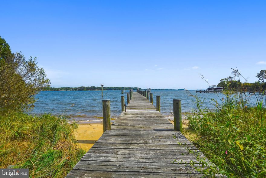 First time ever offered for sale! This well maintained 7,000+ sqft South River waterfront estate is situated on 3.29 private acres with fabulous water views.  You will find two finished levels that offer ample space for many living scenarios such as an au pair or in law suite and home office. This home is an entertainers dream with multiple patios, decks, heated pool, pier with 3 lifts/water/electric, 4ft mlw, and much more. Your vehicles will be well taken care of with an attached two car garage, four car carport and detached 5 car garage. The second level of the detached garage is approx. 1,200 sq ft of finished space with HVAC.