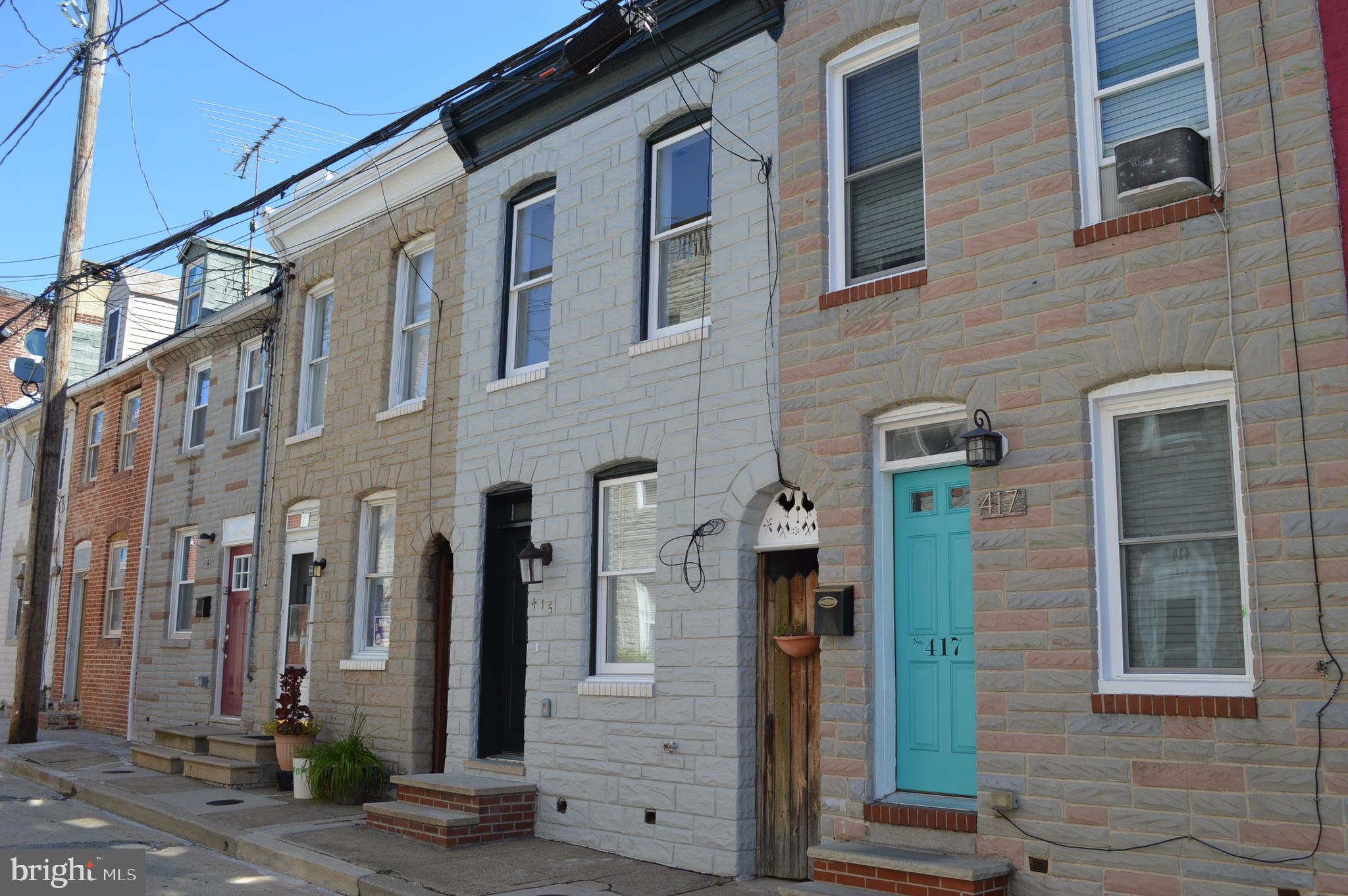Beautifully renovated home a few years ago, and shows very nicely. Bedrooms are both on the 2nd floor, each with a bath. One bedroom and bath at the front and one bedroom and bath at the rear, all off the hall. One bath with a walk-in shower and one with a tub/shower. Laundry/stacked washer & dryer is in a closet off the hall, accessible by either bedroom. Kitchen is very comfortable in layout, featuring lots of cabinet and storage space, lots of counterspace and storage closet. S/S appliances, dishwasher, microwave and dispoal for your convenience. Exit to the rear yard, with a walkable alley to the front street.