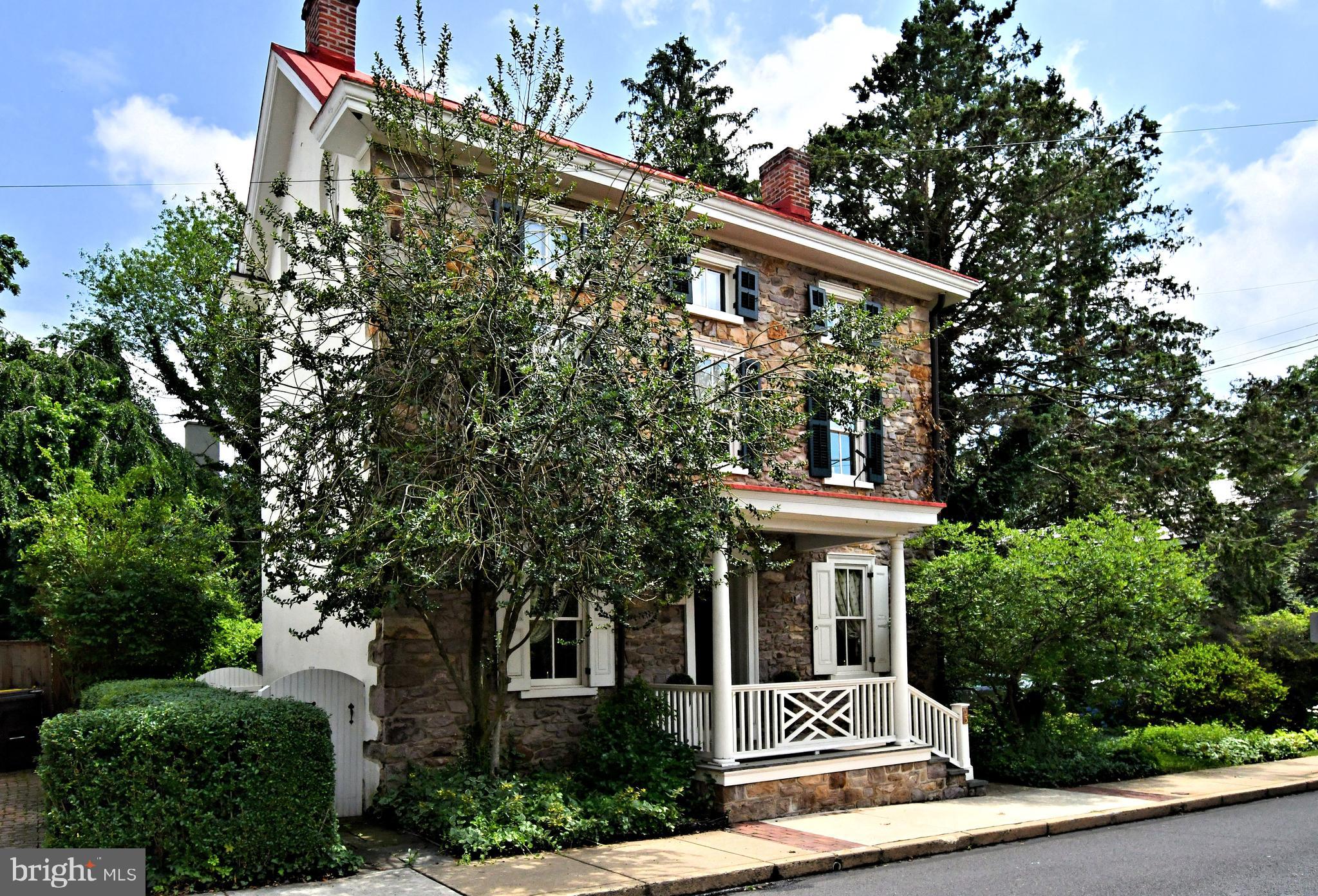 The John Harton House, located in the heart of Doylestown Borough, is available for rent. Built in 1833, this registered historical property with its award-wining gardens features three levels of living space including four bedrooms, one full and one half bath and an enormous closet/laundry room. Stunning wide-plank hardwood floors and moulding along with winding staircases add to the homes colonial charm. The kitchen has been beautifully updated to provide all of today's modern amenities. Enjoy all the borough has to offer without the hassle of parking! This home's driveway can easily fit four vehicles.