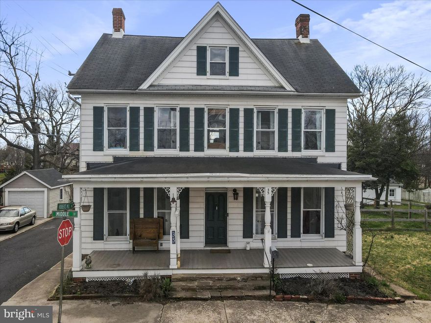 Discover a prime investment opportunity with this charming Colonial-style home built in 1900. This detached residence boasts 1,840 sq. ft. of potential, featuring 4 spacious bedrooms and 1.5 bathrooms. The interior showcases classic wood floors, a formal dining room, and two non-functioning fireplaces, adding character. The attic provides additional storage options. The exterior features two storage sheds and a detached garage with space for two vehicles, enhancing convenience and value. Enjoy outdoor living on the covered porch, perfect for relaxation. The property is equipped with essential appliances, including a washer, dryer, dishwasher, and electric oven/range, making it move-in ready for tenants or future buyers. . Don’t miss out on this versatile investment that combines historic charm with modern potential!