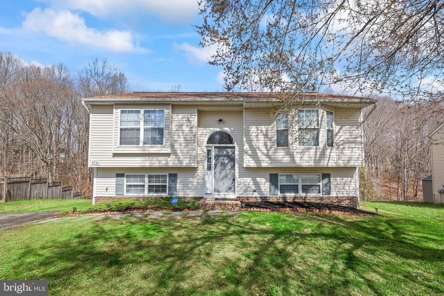 OPEN HOUSE THIS SUNDAY, MARCH 29TH FROM 1-3 PM! Welcome to this charming split-level home offering over 1,400 finished square feet of comfortable living space! Featuring 3 spacious bedrooms and 2 full baths, this home has been thoughtfully updated and is move-in ready. The main level showcases brand-new luxury vinyl plank flooring, complemented by fresh carpet on the stairs for added comfort. The expansive living room boasts a vaulted ceiling and a new ceiling fan, creating a bright and airy atmosphere that flows seamlessly into the kitchen and dining area, highlighted by a stylish new chandelier. Step right out from the kitchen onto the deck, where you can relax and enjoy serene, private views backing to peaceful woods. The upper level hosts the primary suite, while the finished lower level features two additional bedrooms and a spacious recreation room with direct access to the backyard. Additional updates include a new roof installed in 2024, providing peace of mind for years to come. Enjoy the Stonemill community amenities of an outdoor pool, clubhouse, and a playground. Publix, Target, numerous restaurants and other shopping options are just minutes away. And it's just a short drive to the Spotsylvania VRE and I95. This home offers the perfect blend of a functional layout and tranquil surroundings—don’t miss your opportunity to make it yours!