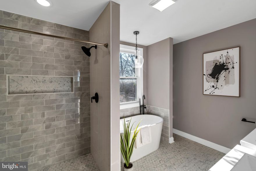 ** Buyer failed to perform**. This one won't last long!!!! Over 3,000 sq ft + of perfect city living, this expertly decorated modern semi-detached townhouse exudes extravagance and practicality!! Enjoy 4 bedroom (2 owners suite)/ 3 full bath / 1 half bath. Phenomenal city living with a generous back fenced area. The main level is perfect for entertaining quests with beautiful hardwood floors, a traditional floor plan and a spacious dining area. Enjoy an upgraded gourmet kitchen with stainless steel appliances, soft close cabinetry and custom tile. The 2nd level features 3 bedrooms and 2 baths. On this level is where you can find the 2nd owners suite. The entire 3rd floor is a primary suite with a spa like bath and huge walk-in closet.