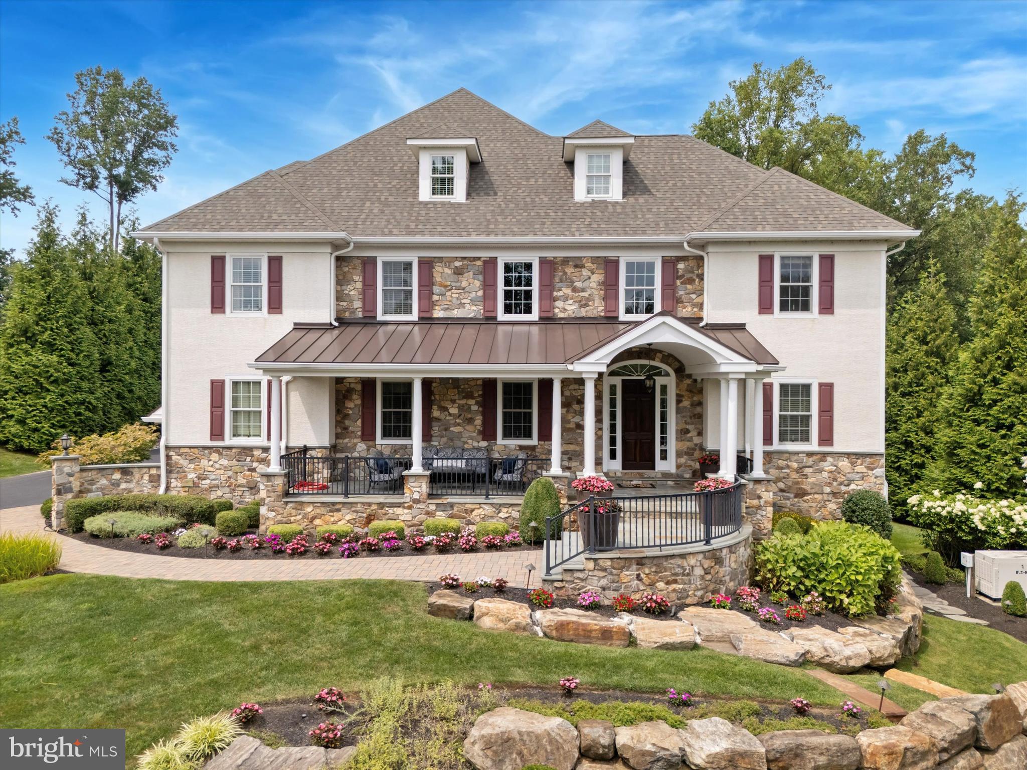 This extraordinary custom built, three story residence offers an unparalleled combination of craftsmanship, luxury and amenities. Featuring 6 bedrooms, 7 full baths, 3 half baths, and a 4 car attached garage, this home is a showcase of refined living. Outdoors, a private retreat awaits with a Ted’s in-ground pool, hot tub, and fully appointed pool house complete with vaulted ceilings, recessed lighting, ceiling fans, abundant cabinetry, double sink, full bath, dressing area, gas fireplace, stereo system, and wall-mounted flat-screen TV, all set within a beautifully fenced rear yard. The finished walkout lower level offers a spectacular entertainment space with a full bar and kitchen featuring two-tier granite counters, refrigerator, microwave, dishwasher and tile backsplash plus direct access to the side yard. Inside, the grand two story foyer with custom curved staircase, wrought iron railings, hardwood floors, crown and chair rail moldings, wainscoting, and recessed lighting sets the tone. The gourmet kitchen impresses with Century cabinetry, level 5 granite, a massive 10' x 6' island, Wolf 6 burner gas range, built-in wall oven and microwave, dual dishwashers, two SubZero refrigerators, and a walk-in wraparound pantry. The kitchen flows seamlessly into the 35' x 20' great room with beamed ceilings, built-in cabinetry, hardwood floors, and integrated speakers. The second level offers a wide landing and multiple bedroom suites, including the primary suite with sitting area, two sided gas fireplace, beverage center, tray ceiling, and spa inspired bath with dual granite vanities, vaulted ceiling, jacuzzi tub, oversized shower, and private water closet. Additional bedrooms include a princess suite, private guest suites and a home office/den. The third floor presents a 26' x 25' family room, hobby space, and ample storage. The lower level continues with two dedicated workout rooms, an in-law/guest/au pair suite and a temperature controlled wine room with capacity for 600+ bottles, wine refrigerators and custom woodwork. Additional amenities include two geothermal HVAC systems with five zones, whole house generator, integrated sound system, security system and numerous custom finishes throughout. This home blends grand scale entertaining with intimate family living, truly one of the area’s most exceptional properties.