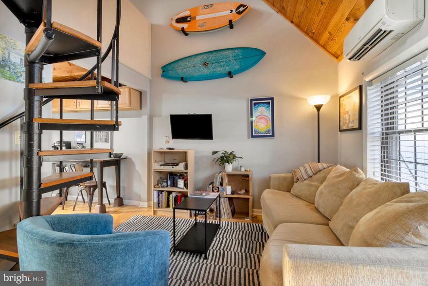 RARE opportunity in coveted Dodds Addition! This charming 2 bed/1 bath beach cottage sits EAST OF ROUTE ONE in the sweet spot between Dewey and Rehoboth - one of the few properties where you can walk to the beach in under 10 minutes AND stroll or bike to both towns' dining, shopping, and nightlife. Park your car on arrival and leave it all week! This efficient 500 sq ft layout maximizes every inch with smart design: an entry-level bedroom, upstairs bedroom, and loft sleeping area accommodates 5 guests comfortably. Outdoor living expands your space with a front deck perfect for morning coffee or alfresco dining, an outdoor shower offering convenience after beach days, plus a private back area ideal for grilling. With plenty of natural light & an open floor plan, hardwood floors on the first level, and the wood vaulted ceiling, this property is full of beach vibes.  Whether you're seeking a low-maintenance personal retreat or a proven investment property with past rental income of $50k, this walkable location offers something increasingly rare in the area - the true beach lifestyle with no need to drive!