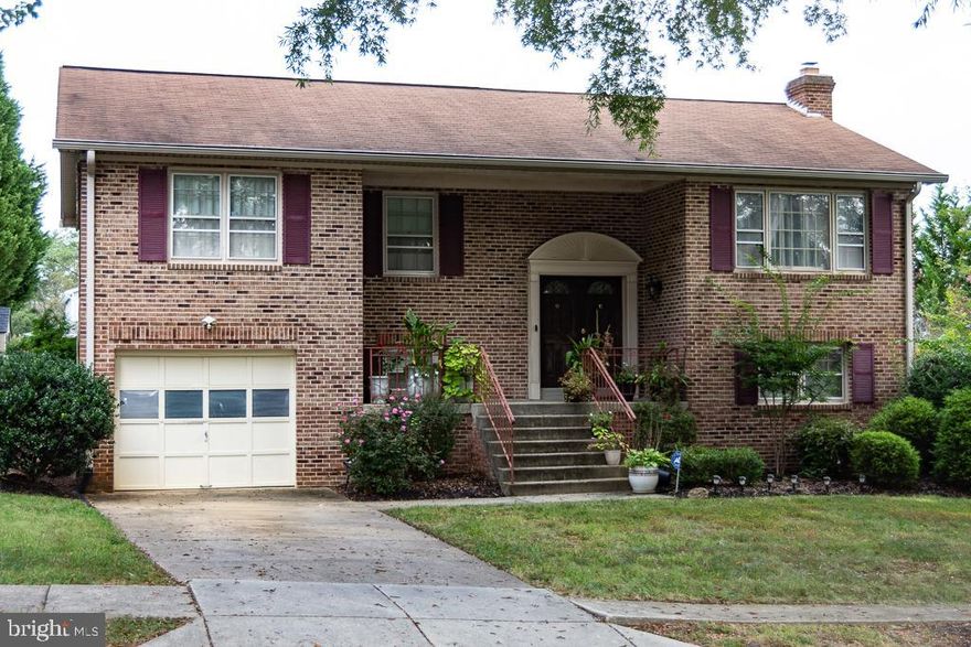 Welcome To This Meticulously Maintained Single Family Home* Split Level Brick With a Large One Car Garage* Elegantly Designed * This Property Boasts 3Bedrooms* 3Full Baths* New 2021 Water Heater *2020 Air Conditioning  Unit* 2 019 Appliances* As You Ste0 Into The Property You Will Be Stunned By The Elegant Chandeliers*  Open Floor Plan* Featuring Hardwood Floors On Upper Level* Well Appointed Living Room* Separate Dining Room * Kitchen With Granite Counters* Stainless Steel Appliances* Smudge Resistant Refrigerator*  Fresh Paint* Huge Master Bedroom With Sitting Area* Master Bedroom With 3 Closets* Master Bedroom Features Sliding Glass Doors With Accessibility To Deck* Master Bath Comes With Glamourous Tiles* Fully Finished Walk-Out  Basement*  Bar Area In Basement For Entertaining* Relax In Front Of This Brick Wood Burning Fireplace* Huge Open Backyard With Large Deck Overlooking Backyard* Shed* Well Manicured Trees* Close To Fine Dining * Shops Restaurants* Easy Access To I-95