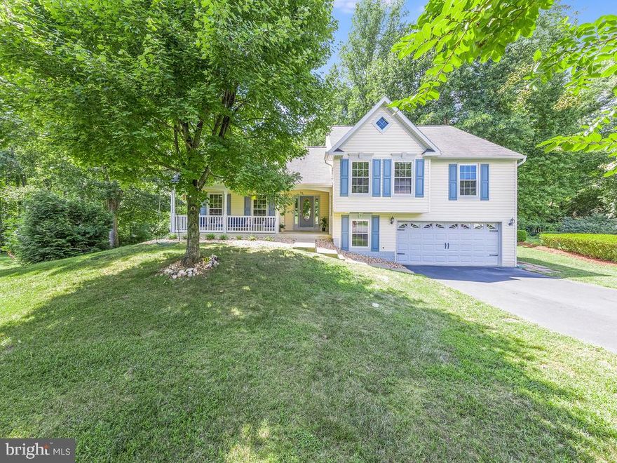 Lovely home on private cul-de-sac in highly desirable Cardinal Forest subdivision is ready for new owners! Relax on your large front porch or back deck overlooking your flat, level lot with tons of trees and greenery. Inside you will find an inviting family room with a vaulted ceiling & custom 2-tone paint. Enjoy meals in the large kitchen with plenty of table space or in the formal dining room. Up the stairs will lead you to two bedrooms, a full bath & a large primary bedroom with en-suite bathroom & huge walk-in closet. Down a few steps into the basement, you have your laundry room, another full bath and a large living space with a wood burning fireplace. Enjoy the rest of the summer at the community pool which is close enough to walk to. Grocery stores, pharmacies, restaurants, and shopping are all within a few minutes to a few miles away.