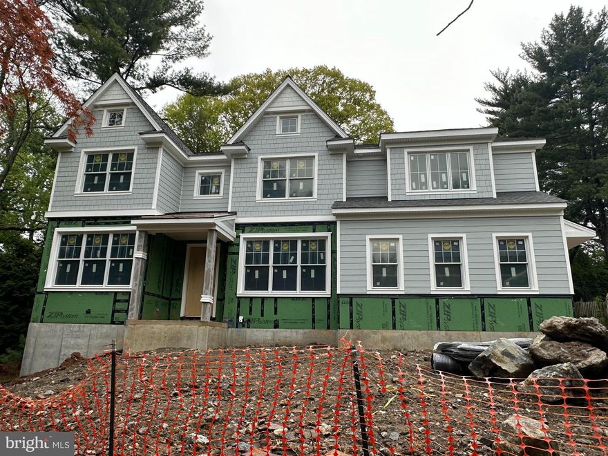 Luxurious New Construction home in quiet Wynnewood neighborhood will be completed by July/August 2023. Built by Falcone Signature Homes, this home will feature 5 bedrooms, 4.5 bathrooms, 3 car garage and has over 4,400 square feet plus an optional  1,300 finished daylight basement. The professionally designed interior has an open floor plan with large windows and tall ceilings. The first floor features a designer kitchen with high end appliances including a double oven, breakfast nook with cathedral ceiling that opens to a covered maintenance-free deck, oversized breakfast island, 6 ft linear gas fireplace, coffered ceilings, two powder rooms, 3 walk in pantries/closets, formal dining room, study/office, butler’s pantry with wine refrigerator, and mudroom with built in bench and cubbies. The second floor features a large Primary Suite with two custom walk-in closets and a sumptuous bathroom with an oversized shower, soaking tub and two vanities. The second floor also includes two en-suites with walk-in closets and full bathrooms, two additional bedrooms that share a jack and jill bathroom, and a large laundry room and hall linen. Modern, professionally designed home in the award-winning Lower Merion School District conveniently located to Center City, major highways and all the Main Line has to offer. Showings require an appointment. Taxes TBD.