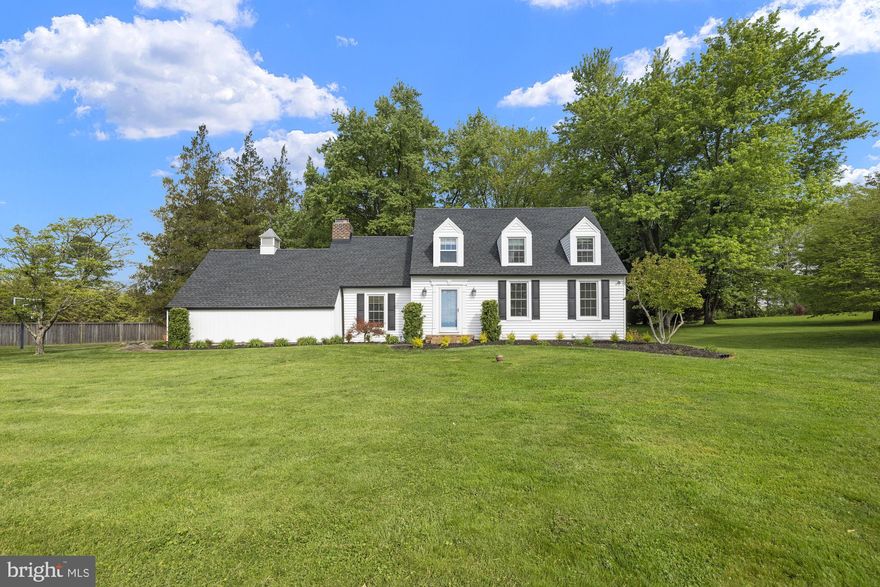 Welcome to this charming Cape Cod nestled in a picturesque, private setting, just minutes from shops, restaurants, and major commuter routes. Offering just under 2,900 square feet, this home blends timeless character with thoughtful updates and inviting living spaces throughout. From the moment you arrive, the home’s curb appeal and long private driveway set the tone. Inside, you’ll find a warm and welcoming traditional layout featuring gleaming hardwood floors, abundant natural light, and classic details such as crown molding and wood beam ceilings. Recent updates include a newer roof, gutters, and siding (2021), as well as a well pump and neutralizer (2022), updated electric panel (2022), and a radon mitigation system, providing peace of mind for years to come. The heart of the home is the eat-in country kitchen, complete with a butcher block island, stainless steel appliances, and built-in cabinetry, perfect for displaying your favorite cookbooks or decor. The main level also offers a cozy den with a wood-burning fireplace, a formal dining room, and a spacious living room ideal for everyday living and entertaining.
Upstairs, the three bedrooms offer charm and comfort, featuring walk-in closets and unique touches such as window seats in both the primary suite and hall bath. As a bonus, a sizable unfinished area provides excellent potential for future expansion or customization. The mostly finished lower level adds additional valuable living space with a full bath, abundant storage, and flexible areas ideal for a home office, gym, recreation room, or hobbies. Step outside to enjoy newly landscaped garden beds, a partially wooded rear yard, paver walkways, a rear patio, and a firepit area—perfect for relaxing or entertaining in a private, natural setting. Schedule your private tour today to experience all this home has to offer!
