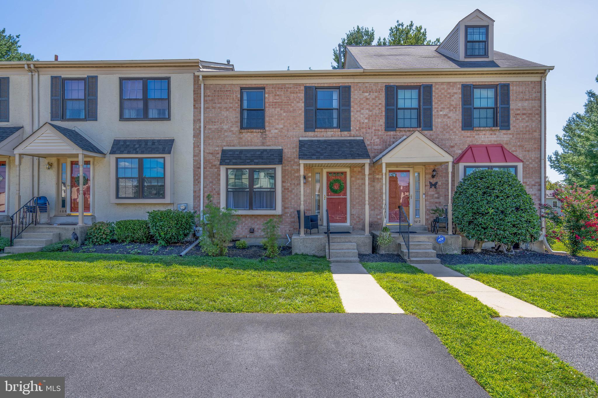 Welcome to Cambridge Square, a sought-after community known for its convenient location and well-kept surroundings. This fine townhome offers comfort, updates, and one of the most desirable settings in the neighborhood. The main level features a large living room that flows into an updated eat-in kitchen with quartz countertops, 42-inch cabinets, and sleek ceiling puck lights. A sliding door opens to a private deck that overlooks a wooded backdrop, creating the perfect retreat for relaxing or entertaining. Warm laminate flooring adds charm, while a new storm door and front door enhance curb appeal. The powder room was beautifully updated in 2020, and the rear deck was rebuilt in 2024. Upstairs you’ll find two generously sized bedrooms and a dual vanity full improved bath. All interior and closet doors have been replaced for a polished look. The spacious basement with high ceilings offers endless possibilities to finish and tailor to your lifestyle. Additional highlights include two driveway parking spaces and a prime location across from a shopping center, with walking trails nearby. Enjoy the convenience of care-free living while being close to major roads, shopping, and dining.