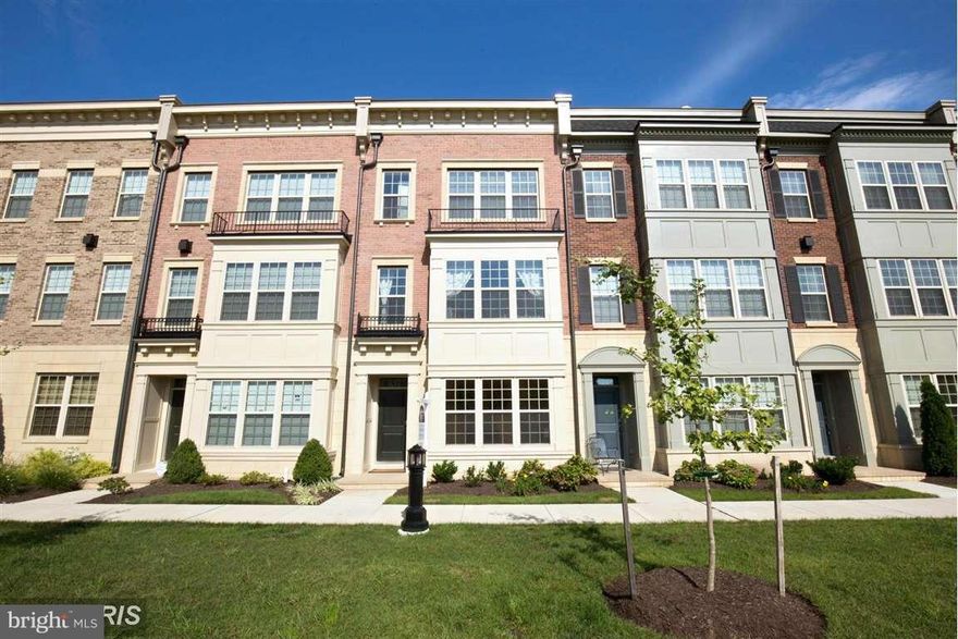 This Stunning Home Features 4-Levels, 3 Bedrooms Possible 4th on Lower Level w/3.5 Baths, Gourmet Kitchen w/ Stainless Steel Appliances & Granite, Pendant & Recessed Lighting, Crown Molding, Hardwood Floors, Wet Bar in Loft on 4th Level, Amazing and Unobstructed Views From Rooftop Deck w/ two sided Fireplace!!! Walk to Restaurants, Shops & Water. Free Shuttle to Metro.