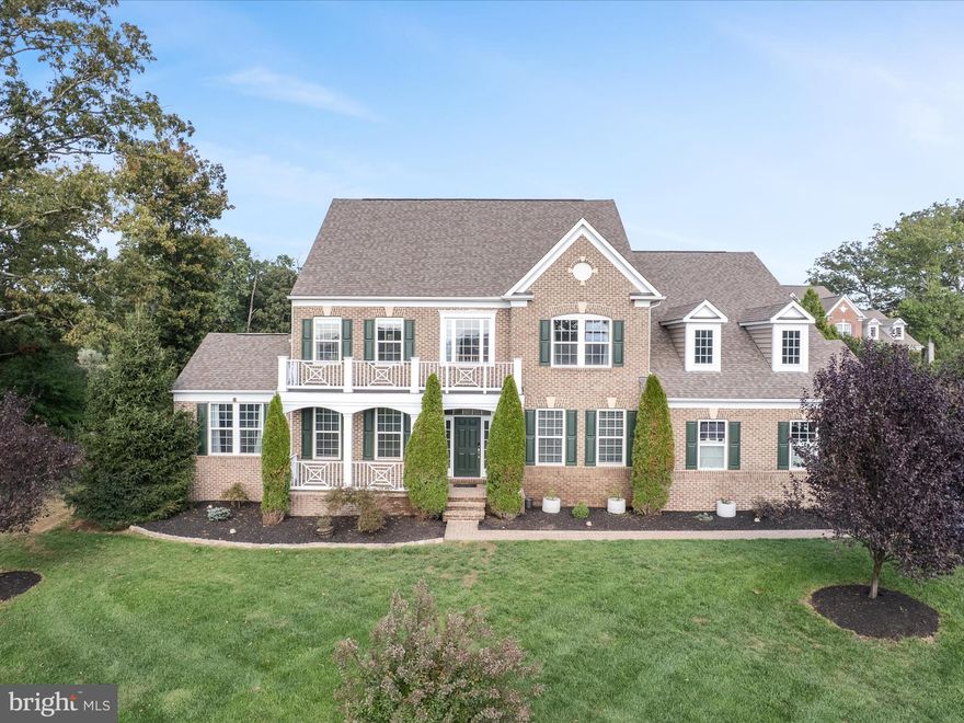 NEW CARPET JUST INSTALLED! PHOTOS TO BE UPDATED!
This gorgeous luxury estate home with 7200+ sq. ft on 4 levels sits in a beautifully landscaped 4.25 acre lot, in the heart of Loudoun County, minutes from Leesburg and convenient to all of Northern Virginia, DC and  the DMV.  With an abundance of green space, backing onto trees, set in the exclusive  Huntleigh at Creighton Farms estates, this 5 bed, 6.5 bath, with additional living and sleeping space, and a bonus suite on the fourth floor, and an in-laws suite on the first floor, lets the tension of life ease away and you relax in your new home.  Whether you are working from home, living with an extended family, raising children, or commuting into the capitol, this estate home has it all.
Cook or cater in the chef's gourmet kitchen with granite countertops and backsplashes, a large center island and coffee bar, looking out through the sunroom. Warm yourself by the stone gas fireplace, enjoy morning coffee and evening sunsets on the patio.  The formal dining room connects to a convenient butler's pantry, perfect for entertaining.  The flow of the first floor is perfect for hosting guests or a quiet family evening, with a living room that opens to a bright and airy conversation nook, and large windows brig natural light and picturesque views of the surrounding greenery into the home.  Additionally, the first floor includes a walk-in pantry, a mudroom and a first floor in-laws / guest suite with attached full bath, easy access for guests, yet separate from upper living area. The upper level offers four generous bedrooms and exquisite master bedroom, bathroom suite with his and hers walk in closets.  This floor includes a separate laundry room with storage.  The topmost floor includes a bonus room, ready for guests or an au-pair,  as a bonus suite, complete with a full bath and open loft space. The basement level walks up to the back yard,  includes tons of space for entertaining, media, exercise and hobbies, featuring an expansive main entertaining area,  an exercise room, a hobby room, and storage . The backyard, which  truly is an oasis designed for the ultimate relaxation and entertainment,  includes a huge hot tub, fire pit, extensive hardscaping  and custom patio.  Play football, practice soccer, host an event or simply enjoy evenings by the fire pit.   The oversized 3-car garage and extended driveway provide more than ample parking,  The home has a recently placed three zoned HVAC,  and supported by a Generac generator - never worry about outages.