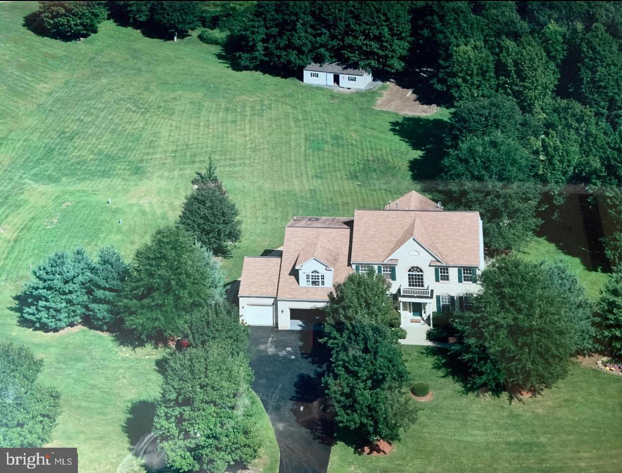 Spectacular 6BR 3.5BA estate on almost 4 acres of manicured lawns - the perfect location to entertain family and friends. If space is what you want, space is what you will find - inside & out - at this home! The main level offers an inviting foyer and formal living, dining room, office, grand family room with vaulted ceiling, powder room and sunroom with sweeping views of the expansive outdoor living space. The beautiful kitchen offers a workplace to create the most exciting culinary delights. It features a large island, ample granite counter space with multiple prep areas, and 42-inch custom cabinets surrounding stainless steel appliances. The upper-level primary bedroom is spectacularly expansive, occupying an entire wing and boasting a vaulted ceiling, sitting, exercise, and work areas. Over 1700 square feet on the lower level is complete with 3 large bedrooms, a full bath, a large laundry room, an exercise/recreation area, home theatre viewing area, and a large storage room. Relax and enjoy the private, serene outdoors while grilling with friends on the expansive deck, playing basketball on the finished basketball court, watching your children play on the outdoor play equipment or in the fun treehouse or making smores at the fire pit. There’s also an onsite dog kennel for your pups to get fresh air and a large shed that can become a He-shed or She-shed with your special touches! Kilby Court in Claggett Landing Estates can match your family's lifestyle if you're looking for a private retreat to come together with family and friends, make memories and have fun! Assumable 3.25% FHA mortgage.
