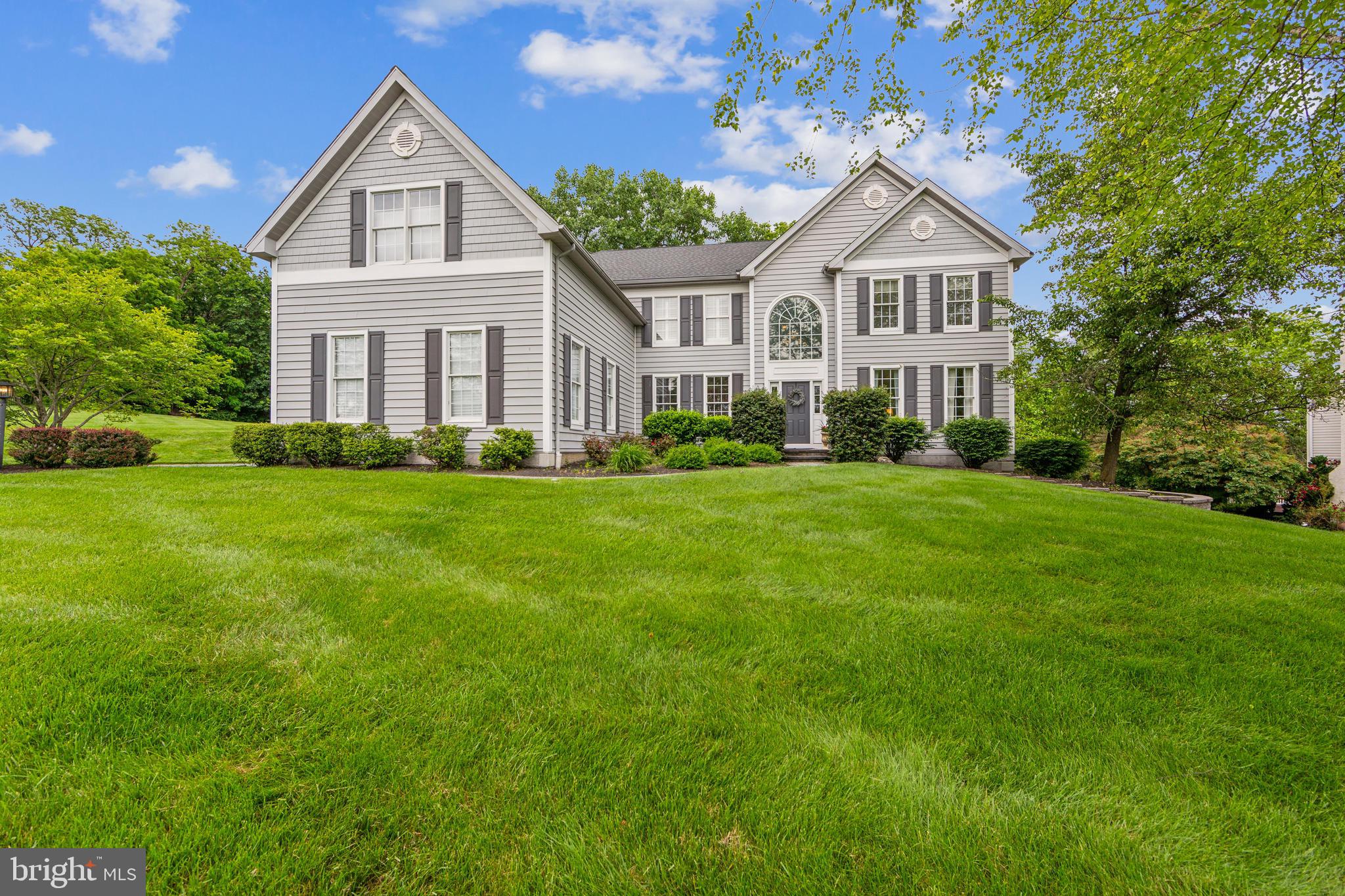 Welcome to this Showcase Property located in the highly sought Swedesford Chase community in convenient Exton. A home where elegance meets comfort at every turn, this expanded Toll Brothers Savoy model will WOW you. Step into the impressive two-story foyer, highlighted by a sweeping curved staircase, and a private first floor office just off the entrance- perfect for work or private study. Entertain with ease in the gracious living room with custom stone gas fireplace, or host memorable dinners in the grand dining room, where angled windows offer serene scenic views. At the heart of the home is a spectacular two-story family room, featuring a floor to ceiling custom stone gas fireplace, surround sound, and custom built-ins, that seamlessly connects to the chef's kitchen -offering stainless appliances, gas range, and walk in pantry - ideal for both everyday living and special gatherings. Enjoy cozy evenings in the nearby fireside media room with plantation shutters and gas fireplace or enjoy the views that surround the property. At days end, retreat to the luxurious primary suite complete with a sitting area and offering plantation shutters, two expansive walk-in closets, and a spa like ensuite bath. Two generously sized bedrooms-both with walk in closets-share a well-appointed Jack and Jill bathroom, while a fourth bedroom enjoys the privacy and convenience of its own full bathroom. The finished lower level is a showstopper- featuring luxury vinyl flooring, custom built-in workstations, granite topped sink area, and additional custom cabinetry. This level also includes a fully equipped home gym (equipment included), a second spacious office with walk in closet and custom built in safe, full bath, DIY dream workshop- complete with work benches, shelving, and cabinetry, and a large storage area- offering flexibility for work, wellness, and play. This well-maintained home offers 3 newer 3-ton HVAC systems, generator ready (including generator) with updated electrical panel, three car garage, and custom landscaping and hardscaping - including a custom patio. This exceptional home (stucco removal in 2021 with new front door and replacement of two new sliders) combines sophisticated living with practical amenities in a prime Exton location within the coveted West Chester School District. Don't miss your chance to make 438 Bowen Drive your next treasured home.