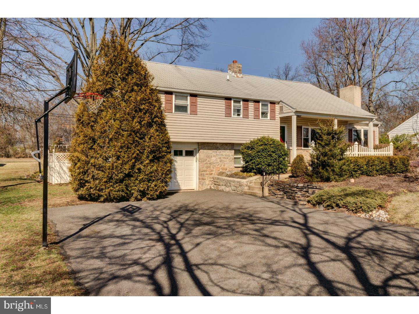 Upon entering this expansive multilevel home, your eye captures immediately the wonderful 1st fl. living space not readily apparent from the curb. The spacious Living & Dining rms, with brick fireplace and shiny hardwood flooring, offer a sense of character and a feel of formality found in well built houses of another era. Blending with formality is the Family or Great Room that spreads out seamlessly from the original footprint. It is the true focal point of family life. Through the side door glass sliders you ease out onto a double level flagstone patio that connects to the den on the lower level through another set of glass doors to provide superb circular flow. This balance of a fine blend of flexible living space makes this a unique property in the sought after Merrybrook community. Upward, the 2nd level MBR has its own powder room complemented by two nice sized brms and updated hall bath. The top level is a large 4th brm that can be a playroom or an additional family room upstairs as the need presents itself. The lower level rounds out the dimensions with the aforementioned den and utility/mud room with quick access into the extra long, attached garage.  Situated on a very manageable 1/3 acre that spreads out into open field, location near Merck, all the amenities, and proximity to major transportation routes makes this home a real gem.