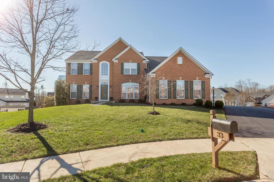 Absolutely Stunning Home in Desirable Neighborhood. Hard to find 3 Car Side Load Garage! Gourmet Kitchen with Upgraded Cabinets and SS Appliances, Open Family Room with Stone Fireplace, Custom Windows and Blinds, Sunroom Opens to Maintenance Free Custom Deck. Master Suite with Sitting Room, His and Her Closets, and Luxury Bath. Fully Finished Bsmt. Almost 1/2 Acre Level Lot! Too Much to List!