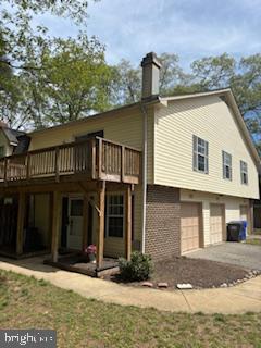 Upgrades completed. Kitchen and baths. New look, New price. 3 bed, 2 bathroom, Townhouse style condo with garage parking. Newly painted, new carpet. Move in ready. See pictures.