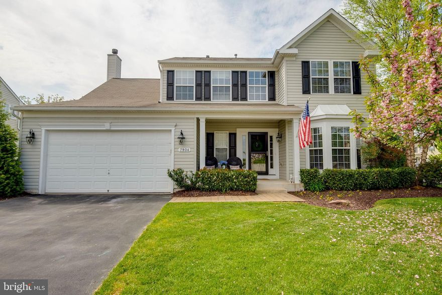 INCREDIBLE NEW PRICE OFFERING!  With over $50K of updates,  this beautiful 4,582 square ft colonial on corner lot in sought-after Waverly Farms is an entertainers dream! Features a deluxe gourmet kitchen with 42" maple cabinets, 8' island with granite, custom backsplash, and Kitchen Aid appliances less than 2 years old. 9' ceilings throughout first floor. Large stone wood burning fireplace in open family room with custom 2 piece crown molding. 1st level HVAC system less than 2 years old. Enjoy your summer evenings rocking on the covered front porch or roasting marshmallows on custom Belgard paver patio with fire pit. Lower level has hickory hardwood flooring, large rec room featuring wet bar rough ins, game area, large storage closets, built-in bookcases, wine room, 5th bedroom and full bath with marble flooring.  Additional features include irrigation system, 3M tinted morning room windows, SONOS interior and exterior music system and natural fence made landscaping. Community features community park with benches and within walking distance to Archbishop Spalding High School and Papa Johns farm. Don't miss out, tour today!