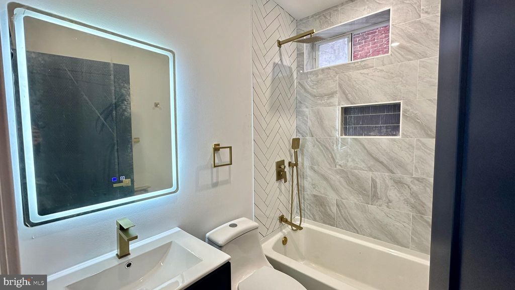 Photo of 4525 N Gratz Street #UNIT A, PHILADELPHIA, PA 19140 (MLS # PAPH2423776)