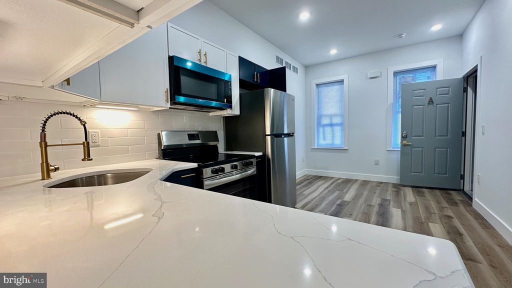 Photo of 4525 N Gratz Street #UNIT A, PHILADELPHIA, PA 19140 (MLS # PAPH2423776)