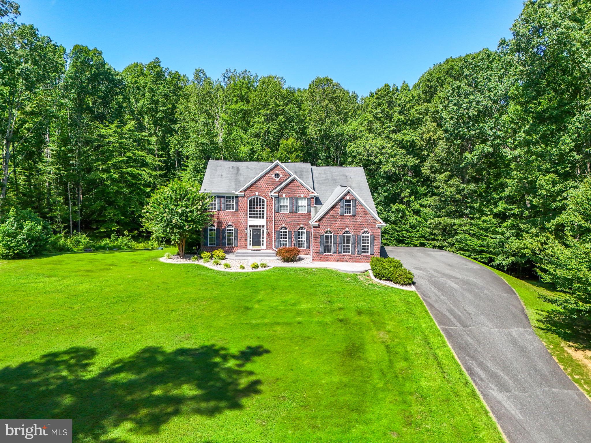 Private Retreat on Over 7 Acres with Park-Like Setting
Welcome to your serene escape nestled on more than 7 acres, offering expansive space, privacy, and endless possibilities. This stunning home features a beautifully designed personal retreat complete with a sitting area, soaring cathedral ceilings, multiple custom closets with built-ins, and a luxurious bathroom that includes a soaking tub and a separate shower.
Upstairs, you'll find generously sized bedrooms and the convenience of a laundry area on the same level. The lower level is a dream for entertaining, featuring a spacious game room, home theatre with a conveying screen, and a full wet bar complete with an additional refrigerator, ice maker, and microwave. A fifth bedroom with a full bath completes this versatile level, perfect for guests or extended living.
The main level showcases a gourmet kitchen with a large center island, seamlessly connected to a sunlit morning room. Step outside to the newer Trex deck and enjoy a private outdoor experience that feels miles away from it all, even within a quiet cul-de-sac.
The property is located within a sought-after school district and zoned A-1, allowing for farm animals and offering potential for an additional residence—please verify with the county regarding homesteading options. The rental price includes water and lawn maintenance.
This is more than a home—it's a lifestyle of comfort, space, and opportunity.