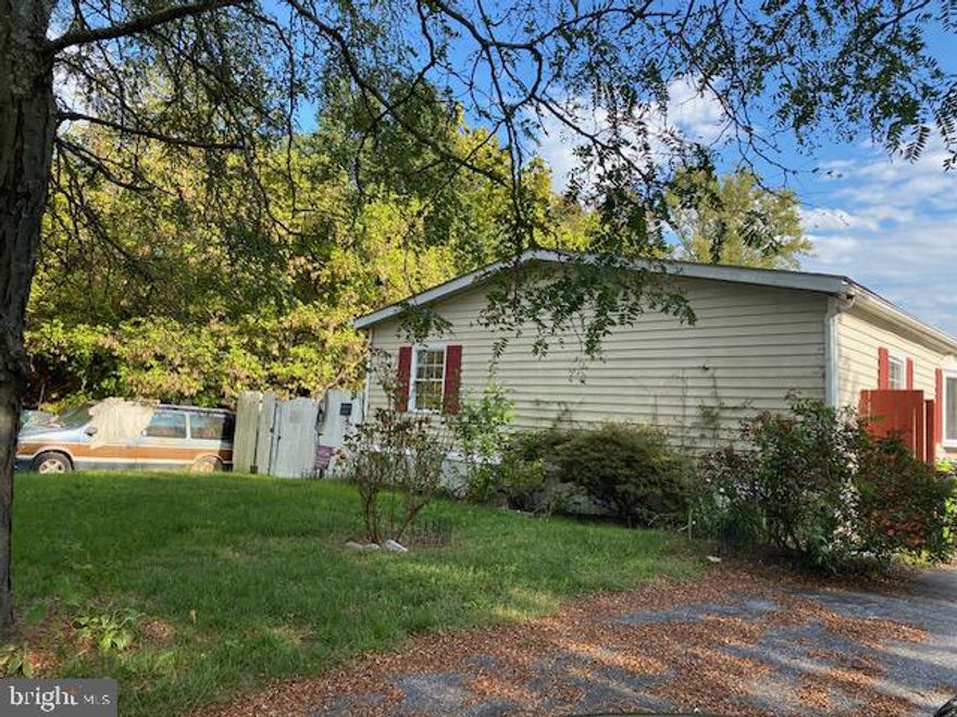 Spacious Doublewide Three bedrooms Two full bath. Master Bedroom has large walk in shower, Kitchen wood cabinets, Stainless refrigerator, Flat top range, Dishwasher, Fresh paint thru out, Separate dining room, Large Livingroom with bay windows, Wall to wall carpet, Laundry room with washer and dryer, Large Deck off laundry room, Ceiling fans, recently updated light fixtures, Roof was replaced in 2017, Recently updated hot water heater,   detached garage, Parking space for 6 , NO HOA or FEES, Private Lot, Ground Rent $700 upon approval by owner, Lot option to purchase in 2 years Call listing agent for more details Also for rent call listing agent for more detail