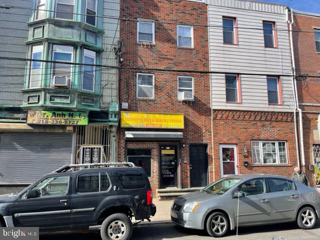 Italian market area, Investment property store front and two family dwelling.
First floor used as an office. Travel agency.
All separate utilities, Second floor large apartment one bedroom, modern bath and kitchen.
Third floor one bedroom, modern bath and kitchen.
