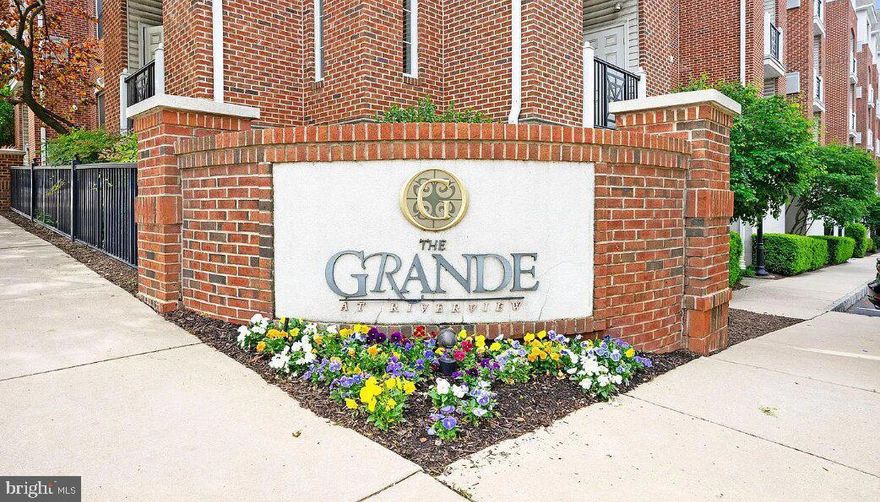 Welcome to this beautifully upgraded two-bedroom, two-bath unit with a loft and two deeded garage parking spaces located in the sought after Grande at Riverview  Community in the heart of ever popular downtown Conshohocken..  You'll love the updated kitchen with white cabinets and upgraded hardware, granite countertops, an upgraded backsplash and stainless steel appliances that overlooks the dining room and family room with a slider to the private balcony.    The master suite boasts 2 closets (one walk-in) both featuring California Closet Organizer systems and an updated master bath featuring a newer vanity, lighting, mirrors, flooring and glass shower doors.  The 2nd suite boasts 2 closets and access to the hall bath. Step upstairs to find a spacious loft perfect for working from home. Additional features include newer, upgraded LVT flooring on the main level and newer upgraded carpeting in the loft, upgraded ight fixtures throughout, new a/c unit and newer hot water heater.  Plus there's a fitness center, outdoor pool and ample extra parking within the community.  Just two blocks to the heart of Conshohocken with great restaurants and shopping.  You don't want to miss this one!