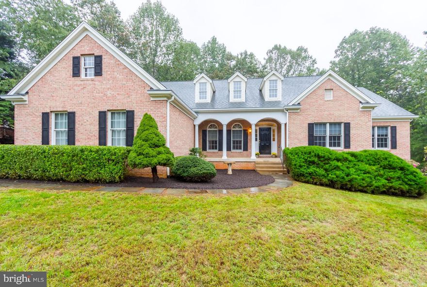 1 Level Living Custom Rambler with 2 finished levels over 3700 finished square feet! Features hardwood floors,Huge Great room with Tray Ceilings,Spacious kitchen with island, breakfast area and gas fireplace.Master with sitting area, 2 walk-in closets&luxury bath, finished basement with rec room, 4th bedroom,huge workshop, Storage Room &more! 1 acre cul de sac lot.