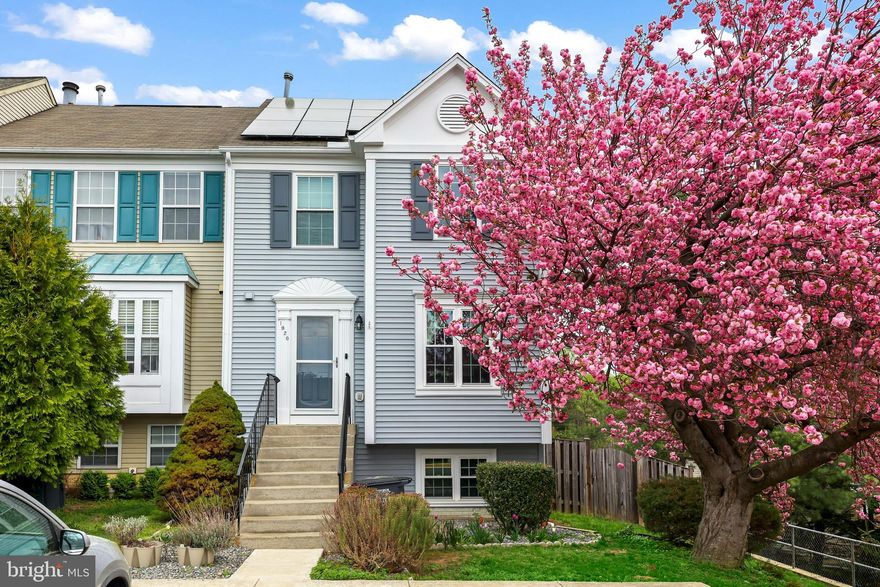 Stunning 3-bedroom townhouse featuring an open layout with abundant natural light throughout. Enjoy a formal dining area and a spacious living room that opens to a private deck—perfect for relaxing or entertaining. Upstairs boasts three bedrooms and a full bath with a large soaking tub, walk-in shower, and dual sink vanity.   Solar panels are installed for efficiency and working.  They convey with the property, and they will be fully paid off at closing.    The  fully fenced backyard ideal for pets. Recent updates include new paint, newer dishwasher & microwave (2 yrs), deck (<1 yr), flooring (3 yrs), and HVAC (3 yrs).