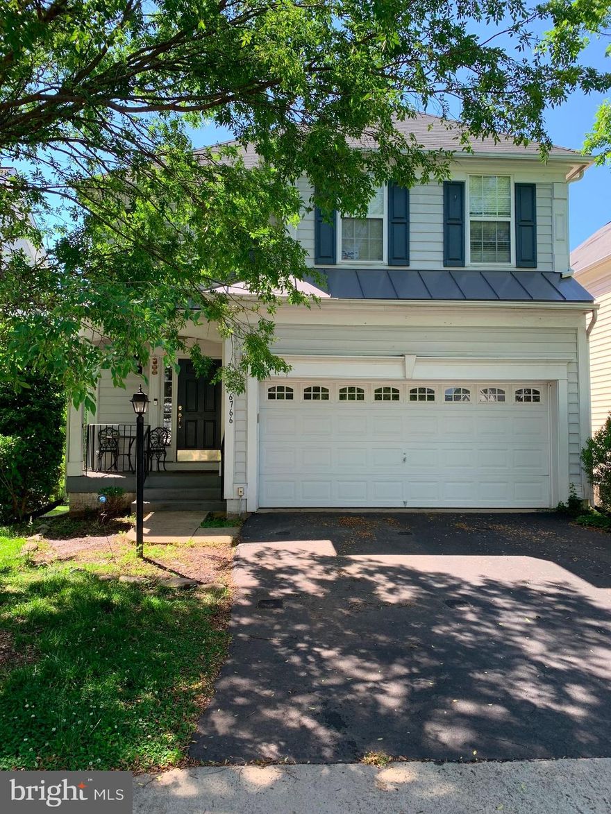 Welcome to your new home centrally located & highly sought after Villages of Haymarket.  Enter through the covered front portico, gleaming hardwood floors throughout the main level.  Large gourmet kitchen has gas cooking, built-in wall oven, stainless steel refrigerator, kitchen island with room for bar stools plus room for a small table eating area.  Separated by a half-wall between the kitchen is the formal dining area.  Very open concept plus the 9 ft ceilings makes the main level feel huge.  Upstairs boasts a massive master bedroom with cathedral ceiling.  Three more ample-size bedrooms, central bathroom, and laundry area completes the 2nd floor.  Finished basement has space galore and walks-out to the back yard.   Property boasts 4 BRs & 5th room in basement currently used as a BR, or can be office.  Furnace area has oversized water heater (less than 2-years old), furnace humidifier, and furnace air purifier.   Prime location, just minutes to groceries, restaurants, entertainment, shopping & everything Haymarket & Gainesville has to offer.  This property wont last long, don't wait!