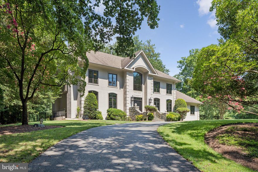 Discover modern luxury in this builder's own custom sanctuary nestled in the tranquil setting of Luxmanor’s Arroyo Drive. This stunning home offers an exquisite blend of comfort and style spanning over 7800 square feet. With soaring ceilings and sun-filled interiors, the living spaces are designed to inspire and delight. 
The formal living room with fireplace and large dining room showcasing custom walls and ceiling treatments, are perfect for hosting memorable gatherings. The kitchen open to the family room offers a breakfast area, expansive center island and extensive cabinetry.  Relax in the spacious family room with 12 ft ceilings and one of four fireplaces overlooking peaceful grounds.  
Two dedicated office spaces, including a library with gas fireplace and sitting area as well as a main level bedroom and full bath cater to today’s dynamic living and working needs. 
Upstairs you’ll find four sumptuous bedroom suites, including a primary suite complete with sitting room and spa bath. 
The expansive lower level offers a 6th bedroom suite along with numerous recreation and entertaining spaces, fitness area and 2 full baths.
Set on a serene 1-acre lot with large deck surrounded by professional landscaping and mature trees, this property offers privacy and a connection to nature. Embrace the perfect fusion of elegance and modern living at 11119 Arroyo Drive.