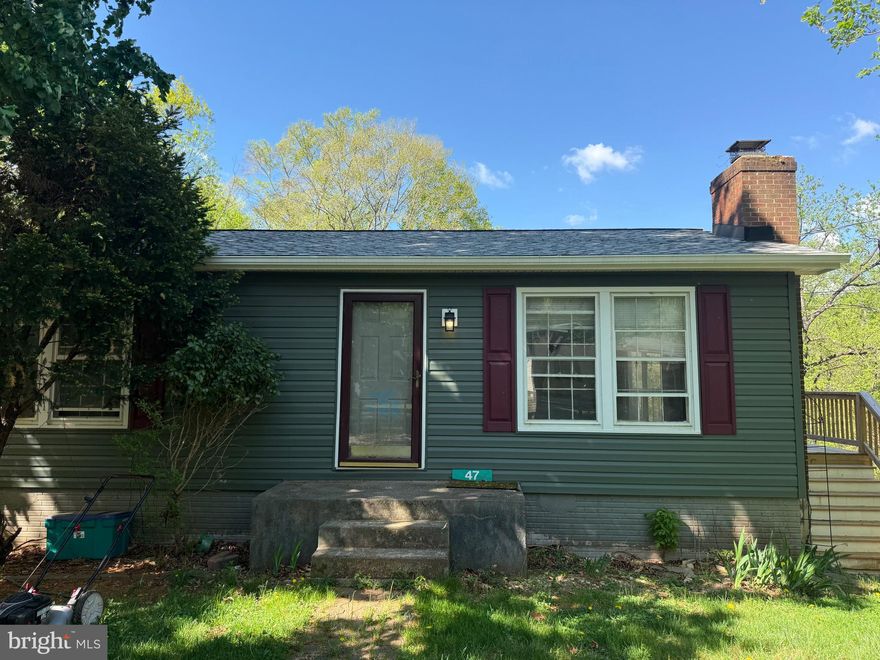 Home sold as is, outside is completely renovated including siding, gutters, new roof and deck. Lot beside home also conveys. 

Interior in need of full renovation. Space in basement for bedrooms if desired.