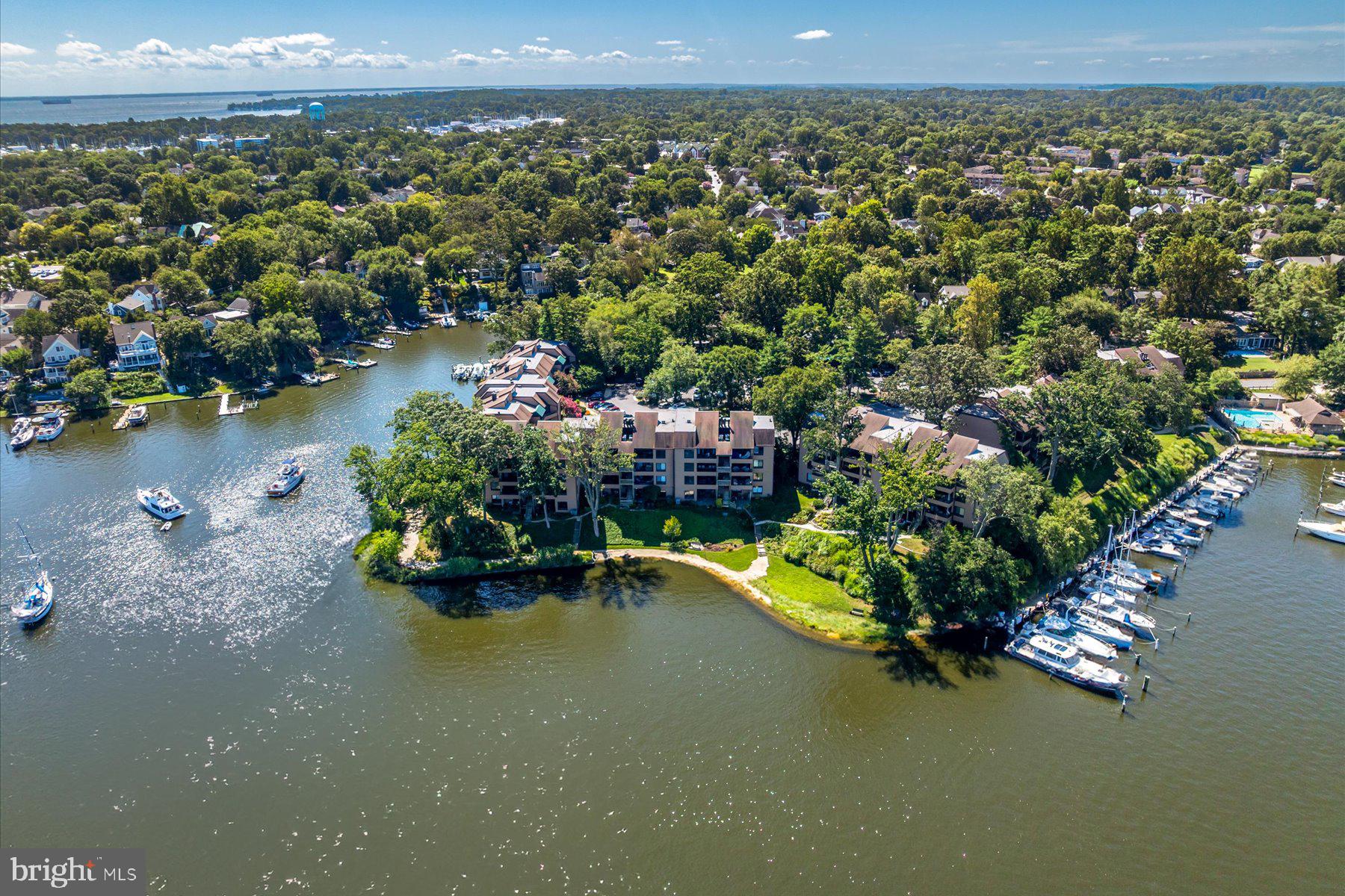 A rare opportunity to own a waterfront residence on Spa Creek with direct views of the State House and St. Mary’s. This first-floor condominium blends the ease of lock-and-leave living with the prestige of a premier Annapolis address. Refined interiors feature wide-plank flooring, a chef’s kitchen with stainless steel appliances, one bedroom with ensuite bath plus a secondary powder room, bonus space/office, fireplace with bespoke surround, and seamless flow to a private balcony over the water. Additional amenities include in-unit laundry and secure community storage. The private community offers a pool overlooking Spa Creek, marina with slips, clubhouse, and tennis courts. Step onto the water taxi for a direct ride into Historic Annapolis, celebrated for its world-class dining, boutiques, and yachting culture. Perfect as a primary residence or weekend retreat, this property offers effortless waterfront living in one of the East Coast’s most iconic sailing capitals.