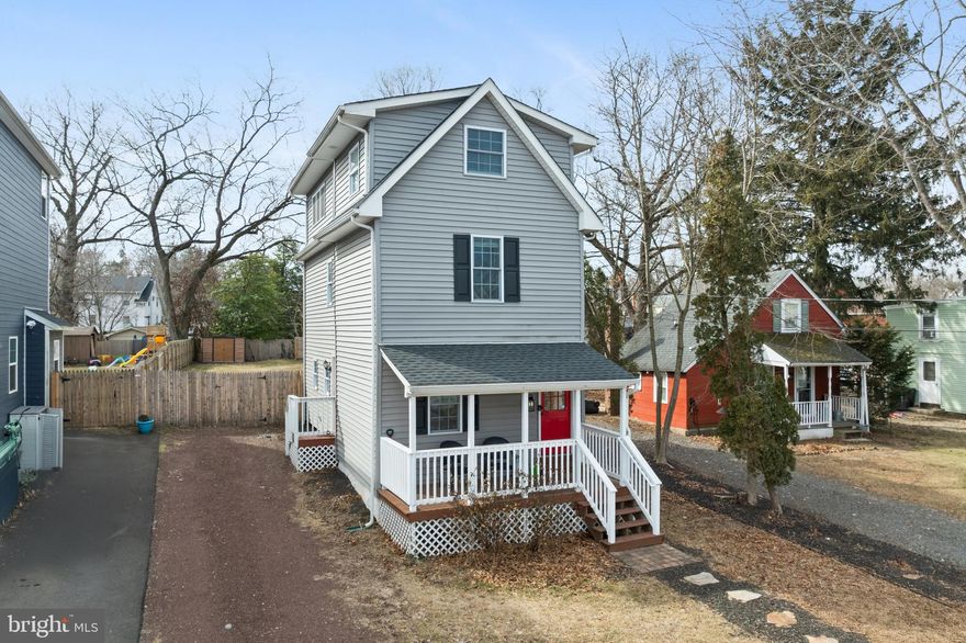 Step into this beautifully remodeled, historical, 1900's home and enjoy the modern updates along with the old world charm.  The major renovation was completed in 2019, so most items in and on this house are less that 5 years old!  On the first floor you will find an updated eat in kitchen with stainless steel appliances and solid surface countertops.  A powder room and living room are also on this level. Then head upstairs to find two nice sized bedrooms and a full bathroom with a double sink vanity and tub/shower combo.  On the third floor you will find the main bedroom with an ensuite bathroom.  Engineered hickory hardwood flooring can be found throughout.  In addition, the backyard has been fully fenced in and is ready for your furry friends or children to run free.  There is a restored historical church across the street and in a short walk, you can be at downtown shops and restaurants.  Public transportation is right around the corner as well.  The property is not in the flood plain, however, at the end of the street is direct canal access!  The property is convenient to major roads and highways.  Come and see all that this home has to offer!