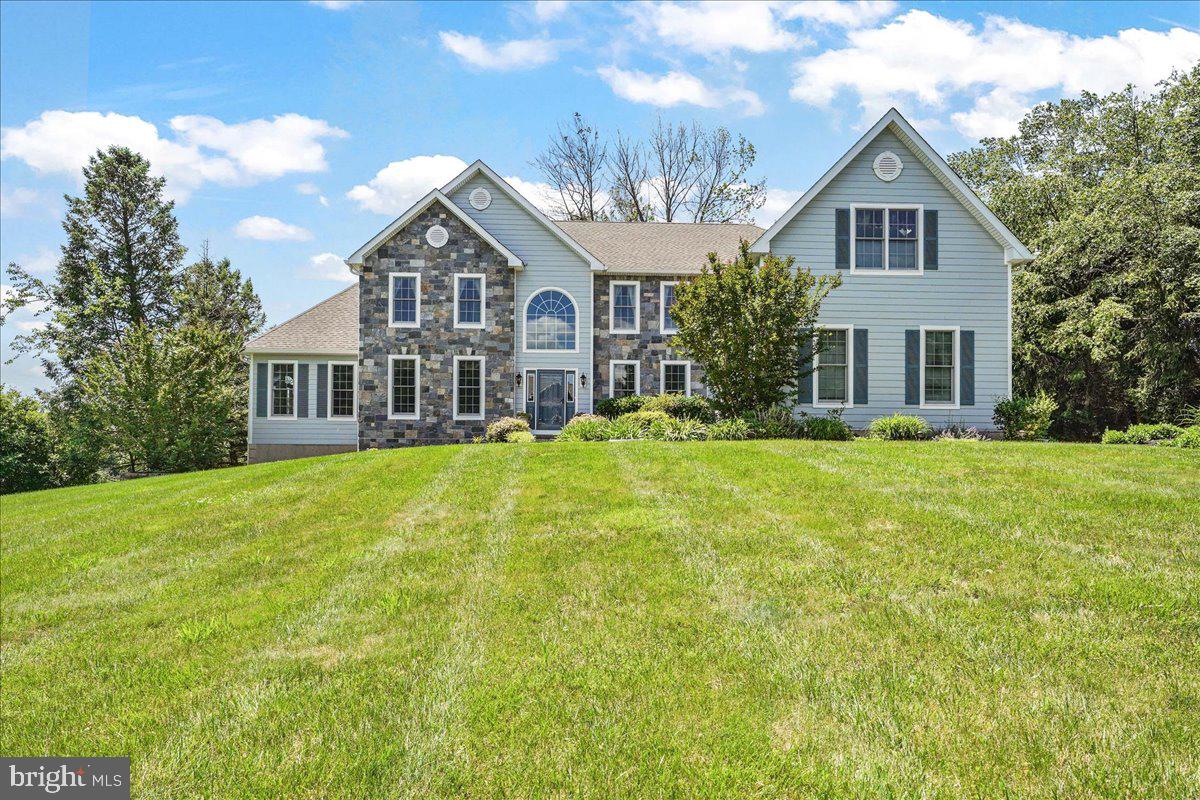 Welcome to 3 Hempstead Road in the desirable Springton Pointe Estates neighborhood in Newtown Square. This gorgeous, immaculate, and meticulously cared for home with over 7,000 square feet of living space offers 5 spacious bedrooms, 4.1 baths including a large two-room in-law suite with a nearby full bath now available! The dramatic two-story entry features a gracious curved staircase. A formal living room, formal dining room, and office are near the front entry. Enjoy the bright and cheery conservatory room with walls of lovely casement windows and a two-story tray ceiling with ceiling fans that offers a fabulous area to entertain family and friends. The gourmet kitchen with granite counters, 42" maple cabinets, upscale stainless steel appliances such as a Wolf cook-top and other Bosch appliances, a large island, pantry, breakfast area, and new French doors with built-in glass blinds lead to the deck with steps to the rear yard and lower level paver patio. The open floor plan kitchen opens up to an amazing two-story family room with new tinted palladium windows, a floor-to-ceiling stone gas fireplace plus custom built-in cabinetry. A rear open staircase provides direct access to the bedrooms upstairs from the family room however the bedrooms are down the upstairs hallway from the staircase which will minimize noise from the main level of the home. There is also a mudroom with access to the three-car garage and to the laundry room with an exterior door with access to the driveway. The primary bedroom suite with a tray ceiling, sitting room, two large closets, and a spa-like primary bath with two large vanities, a jacuzzi tub, shower, and a separate toilet room. There is an en suite bedroom with a full bath with a large closet plus 2 other bedrooms (Jack n' Jill ) with a full bath with a skylight as well on this level. Note: all bedrooms are very spacious and larger than many area homes. The fifth bedroom on the daylight lower level can be used as an in-law suite or possibly a fitness studio. A full bath is also located on the lower level. There is a wet bar with a refrigerator and several open areas in this expansive lower level. There is an area perfectly situated for billiards or a ping pong table. The natural light and the high ceilings on this lower level create another level of "wow" in this amazing home! Three zoned HVAC. Two of the HVAC units and the hot water heater have been recently replaced. Natural gas, public water, and public sewer. Hardie plank siding and natural stone were added with new masonry stucco added to the exterior concrete foundation walls. New French doors with built-in blinds were also added. No sidewalks to shovel snow since there are no sidewalks on this side of the street! A one-year HSA Home Warranty is included in settlement. Located with the Marple Newtown School District with Culbertson Elementary School and many nearby private schools. Shopping at Whole Foods, Acme, and Giant Foods is only a couple of minutes away. Dining, shopping, and exploring the many area park opportunities await you! Conveniently close to Main Line, Media, West Chester, King of Prussia, downtown Philadelphia, Wilmington as well the Philadelphia Airport. Enjoy the virtual tour video of this lovely home!
