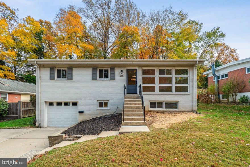 Bright and inviting rancher in the sought-after Twinbrook Forest community of Rockville! This 3-bedroom, 2-bath home offers a comfortable layout with hardwood floors, a spacious living room featuring a large picture window and high ceiling, and an updated eat-in kitchen with granite counters, shaker-style cabinets, and stainless steel appliances. The dining area opens to a screened porch and large deck—perfect for entertaining. The finished lower level includes a modern full bath, recreation or office space, laundry, and access to the one-car garage. Enjoy a quiet tree-lined street with no homes directly across, easy parking, and a large fenced yard with mature trees. Major updates include new appliances (2025), new paint (2025), updated plumbing (2023), new front and bedroom doors, deck and porch repainting, gutter covers, and a Level 2 EV charger. Just 2 miles to Twinbrook Metro, near Broome Athletic Park, Rock Creek Trail, and major commuter routes. Move-in ready and beautifully maintained!