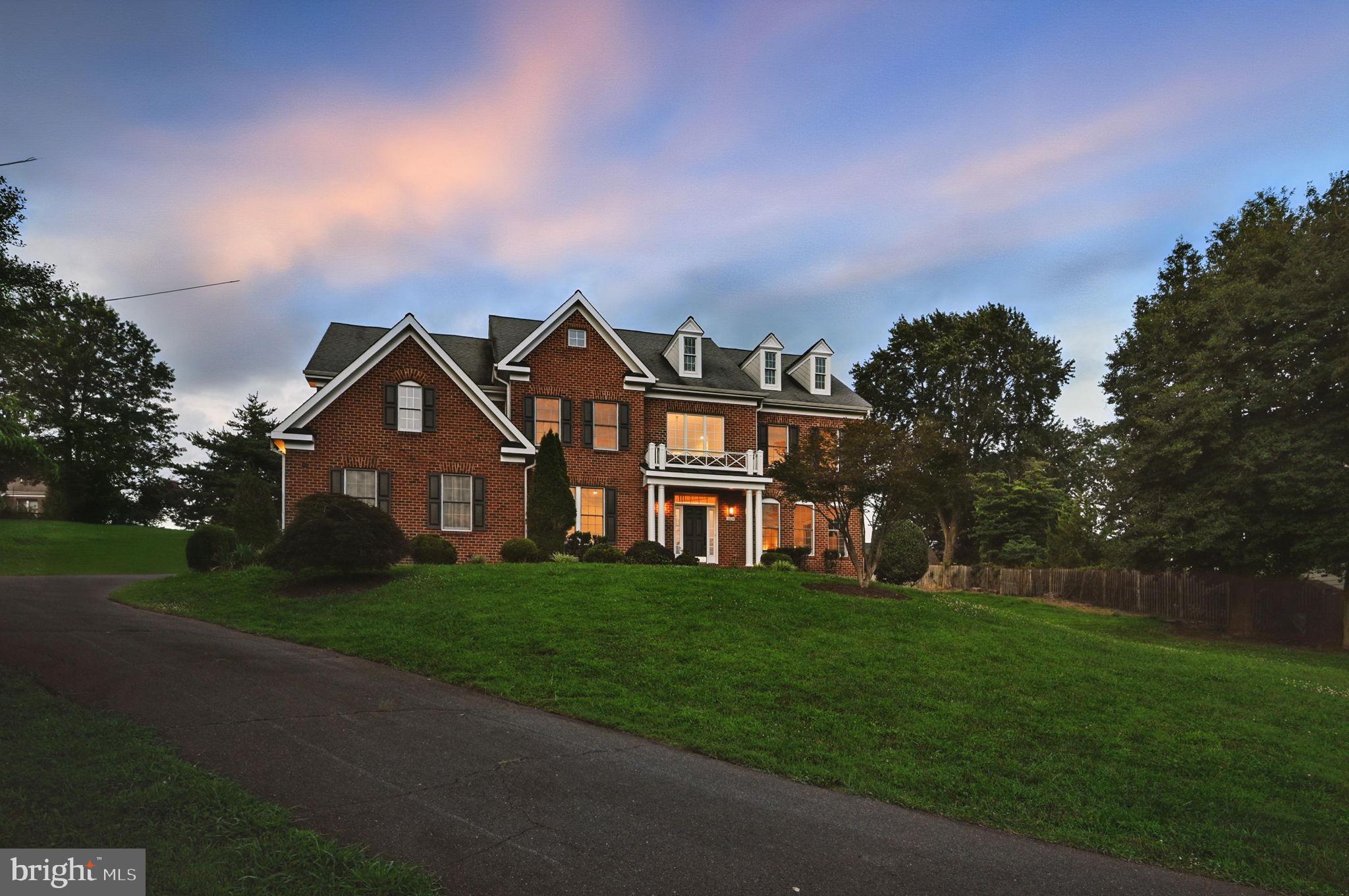 Welcome to a Rare Offering in Salona Village — One of McLean’s Most Coveted Neighborhoods
Please lick the youtube/video
This exceptional property is set on a generous 0.88-acre lot and offers over 7,500 square feet of finished living space. Designed with timeless brick construction on three sides, the home blends space, functionality, and quiet elegance in a highly sought-after setting.
Please Note: The deck shown in the rendering is included in the asking price. However, other features such as hardscaping, additional softscaping, a swimming pool, patio, or retaining walls are not included and are available as optional upgrades for an additional cost.
Upon entry, a soaring two-story foyer welcomes you into a light-filled and thoughtfully designed interior. To the right, the spacious living room features oversized windows, creating an inviting space for everyday relaxation or casual entertaining. The adjoining formal dining room provides a warm setting for family dinners and holiday gatherings.
At the heart of the home, the kitchen has been recently refreshed with a newly expanded island, quartz countertops, custom cabinetry, and updated lighting. It flows effortlessly into a sunlit breakfast nook and a generous family room—together forming a bright and open living space with a full wall of windows. This entire area connects directly to the newly constructed deck, creating a seamless indoor-outdoor transition ideal for entertaining or enjoying peaceful views of the backyard.
To the left of the foyer, a private study enclosed with French doors offers flexibility for a home office or quiet reading room.
Upper Level Highlights:
The primary suite is a true retreat, complete with a sunlit sitting area, two walk-in closets, and ample space for unwinding. Three additional bedrooms share two full bathrooms, while a large semi-finished bonus room on the upper level 2 offers endless potential for a playroom, art studio, or custom workspace.
Lower Level Highlights:
The walk-up lower level is equally adaptable, featuring a spacious recreation room, a separate room with a full bath—ideal for guests or a home office—and a large unfinished area ready to be transformed into a gym, home theater, or hobby space.
Recent 2025 Updates Include:
--Brand-new deck TO BE installed .
--Quartz kitchen countertops and newly expanded island
--New carpet on the main and upper levels
--Fresh interior paint throughout
--Updated light fixtures
--A high-capacity generator(not new but never been used )
Prime Location:
Located within the highly regarded McLean High School pyramid, the home is just minutes from Tysons Corner, Metro access, upscale shopping, fine dining, and major commuter routes to Washington, D.C.
With its expansive interior, flexible layout, and premium location, this home presents a rare opportunity to live in one of McLean’s most prestigious neighborhoods—whether you're ready to move in or envision tailoring it to your unique style.