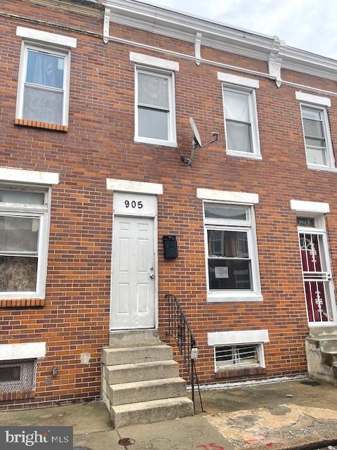 REDUCED!!! Come view this Hidden Gem at 905 N. Belnord.....This delightful brick home in the heart of the city, nestled on a quieter one-way street is close to parks and Johns Hopkins Hospital. It is solid and has a well-built frame, making it a perfect canvas for your personal touch. Enjoy peace of mind with a newer hot water heater and roof. Ceramic title in the bathroom and kitchen. The kitchen also has brand new cabinets. It just needs a good cleaning, new carpet and paint to transform it into a stunning residence or money-making rental property. 3rd bedroom is a pass-through which could also be used as an office or den. Listed much lower than comparable properties in close proximity. Make your apt today before it's gone!! Ask your Real Estate Agent to read the agent remarks which gives instructions on how to submit an offer.